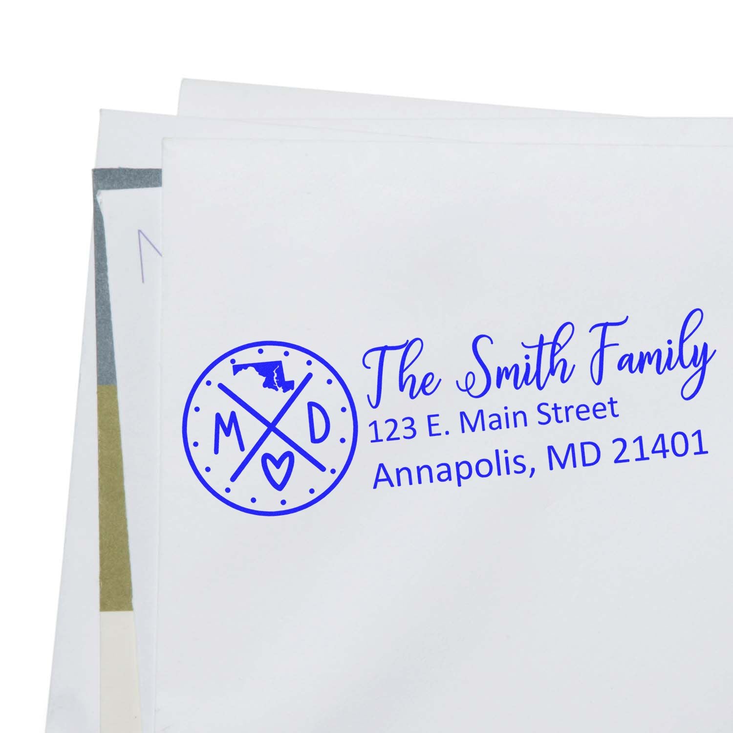 Custom return address rubber stamp for The Smith Family with monogram, Annapolis, MD 21401, blue ink.
