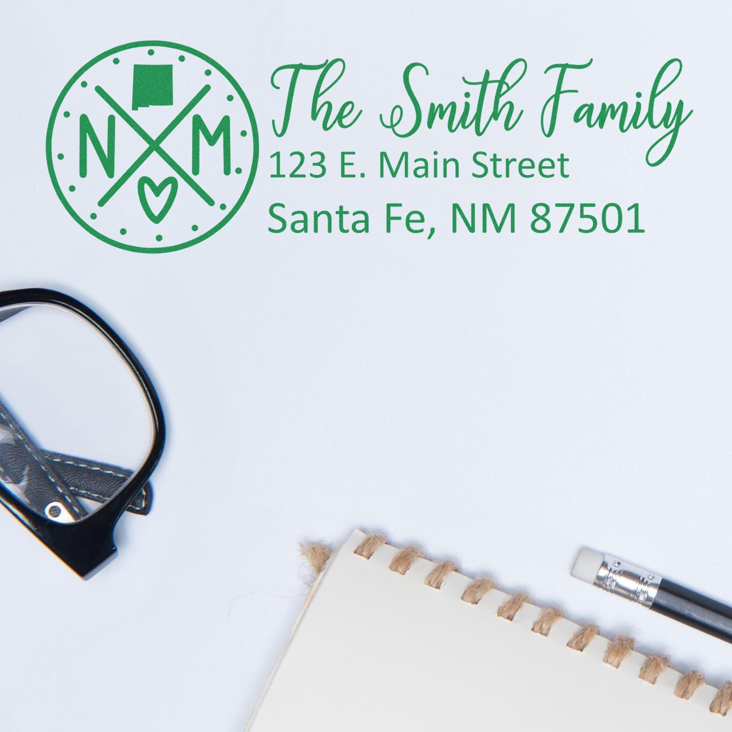 Personalized return address rubber stamp for The Smith Family, with monogram and Santa Fe, NM address.