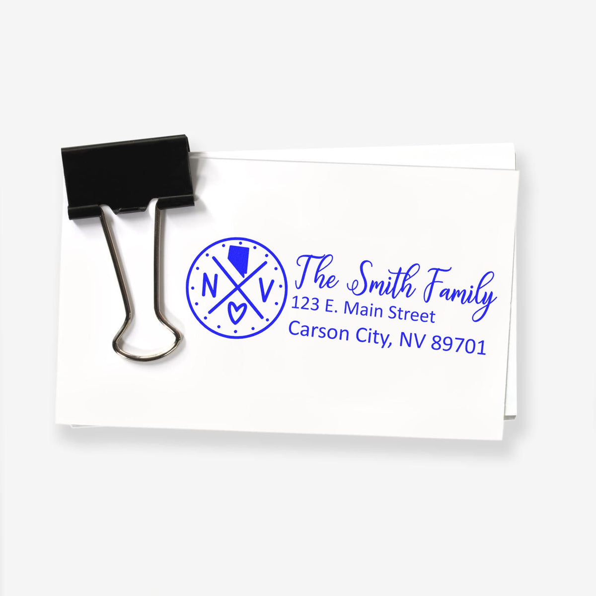 Custom family return address rubber stamp for The Smith Family, with monogram logo and Carson City, NV mailing address.
