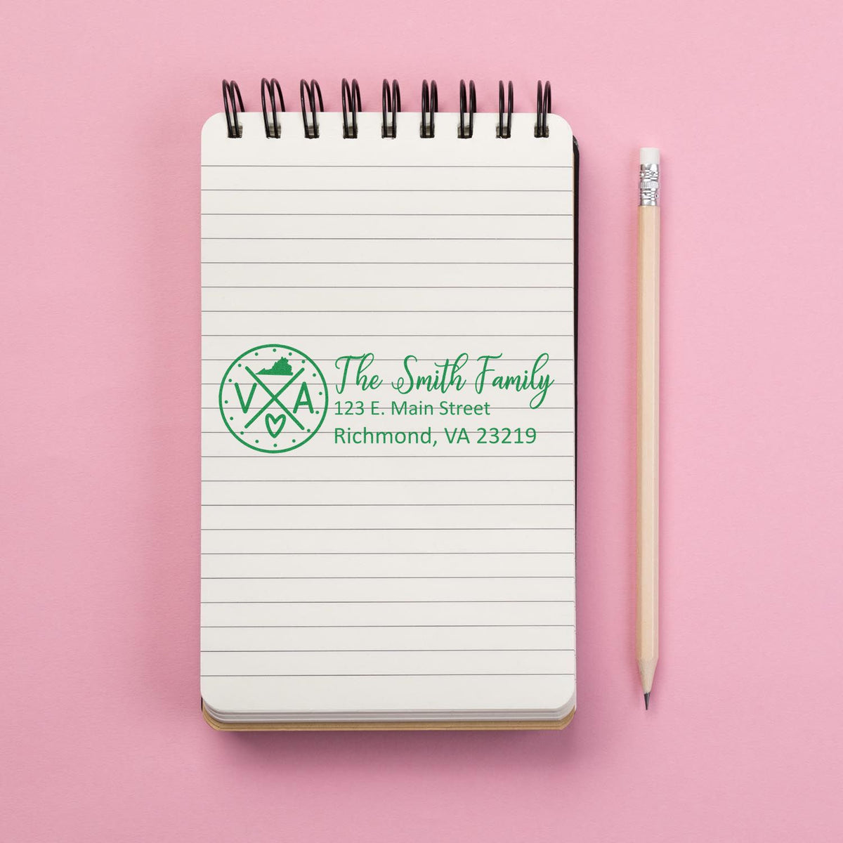 Personalized return address rubber stamp design on notebook, featuring The Smith Family and Richmond, VA address.
