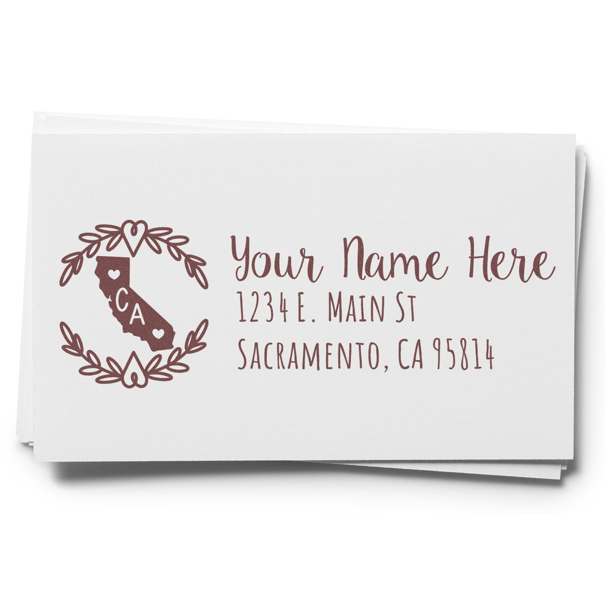 Custom California return address rubber stamp mockup with state icon, personalized name, street address, and Sacramento, CA ZIP code.
