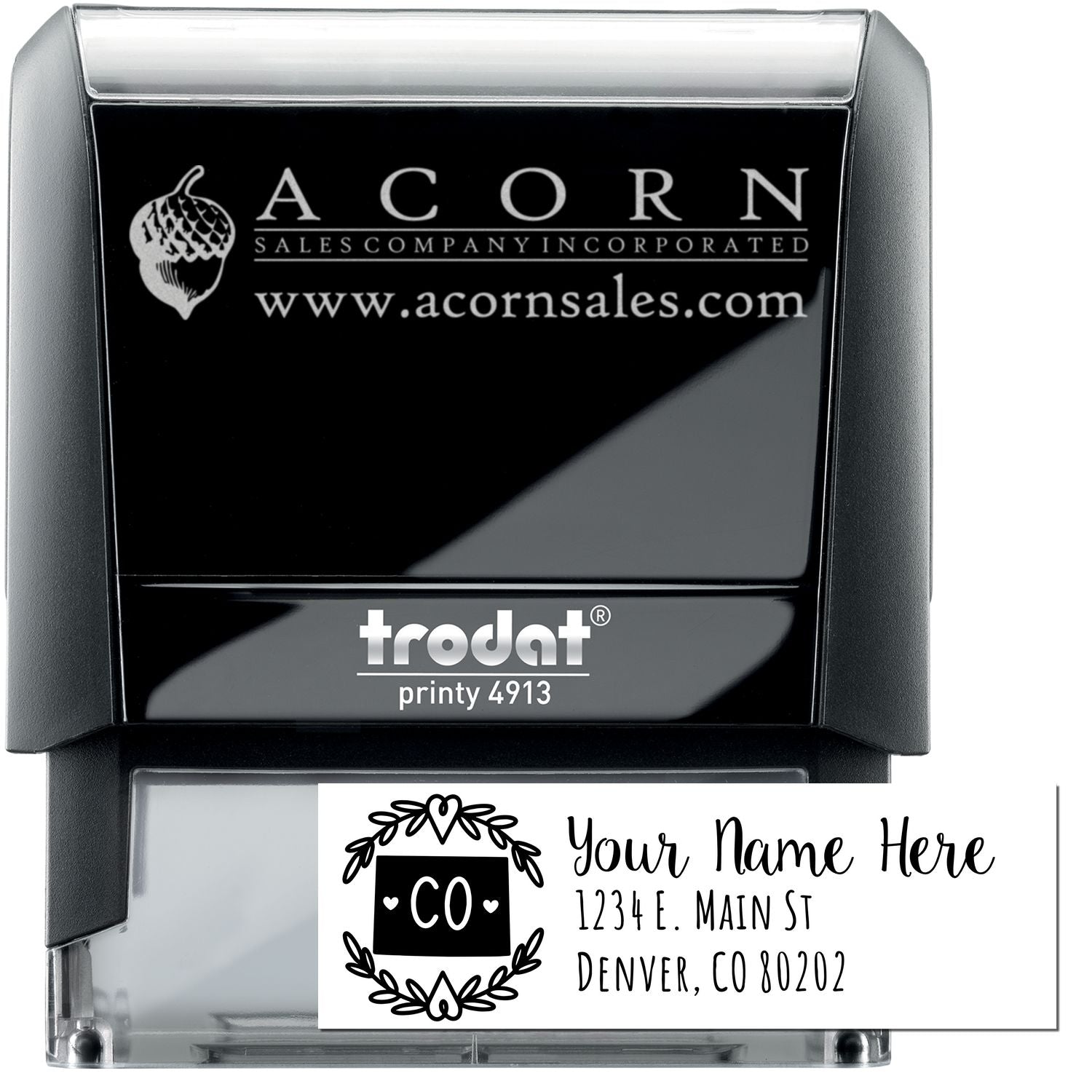 Trodat Printy 4913 self-inking rubber address stamp with custom Colorado return address design for business mailing.