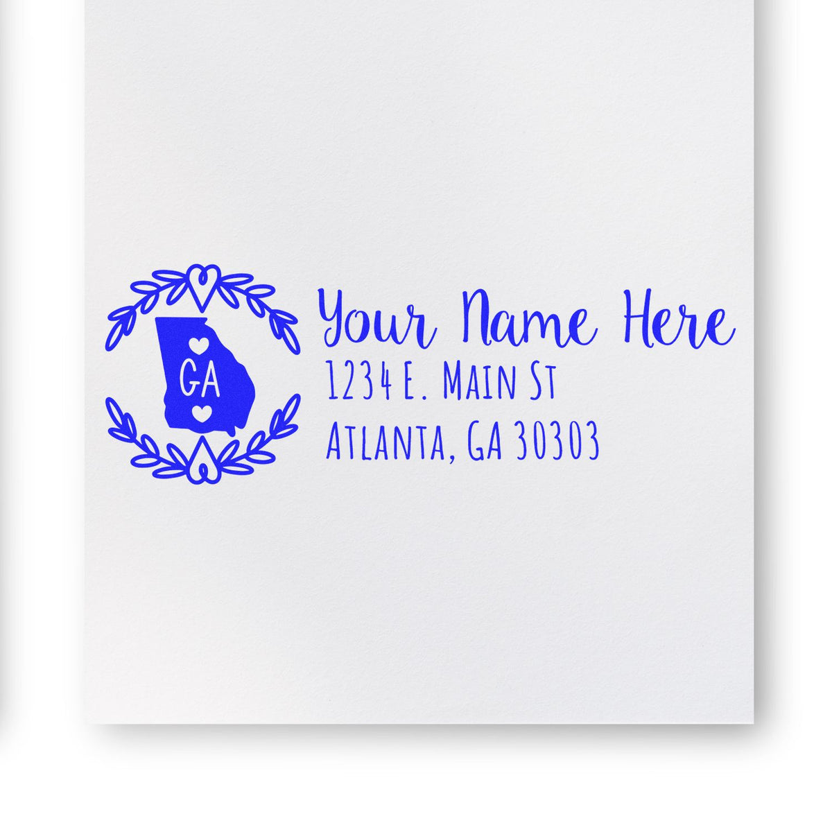 Custom rubber stamp return address design with Georgia state icon, name placeholder, and Atlanta, GA address in blue ink.