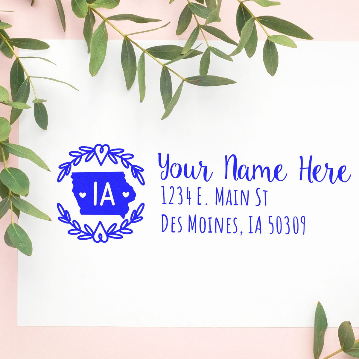 Personalized Iowa address rubber stamp with custom name, street address, and Des Moines, IA ZIP code for envelopes.