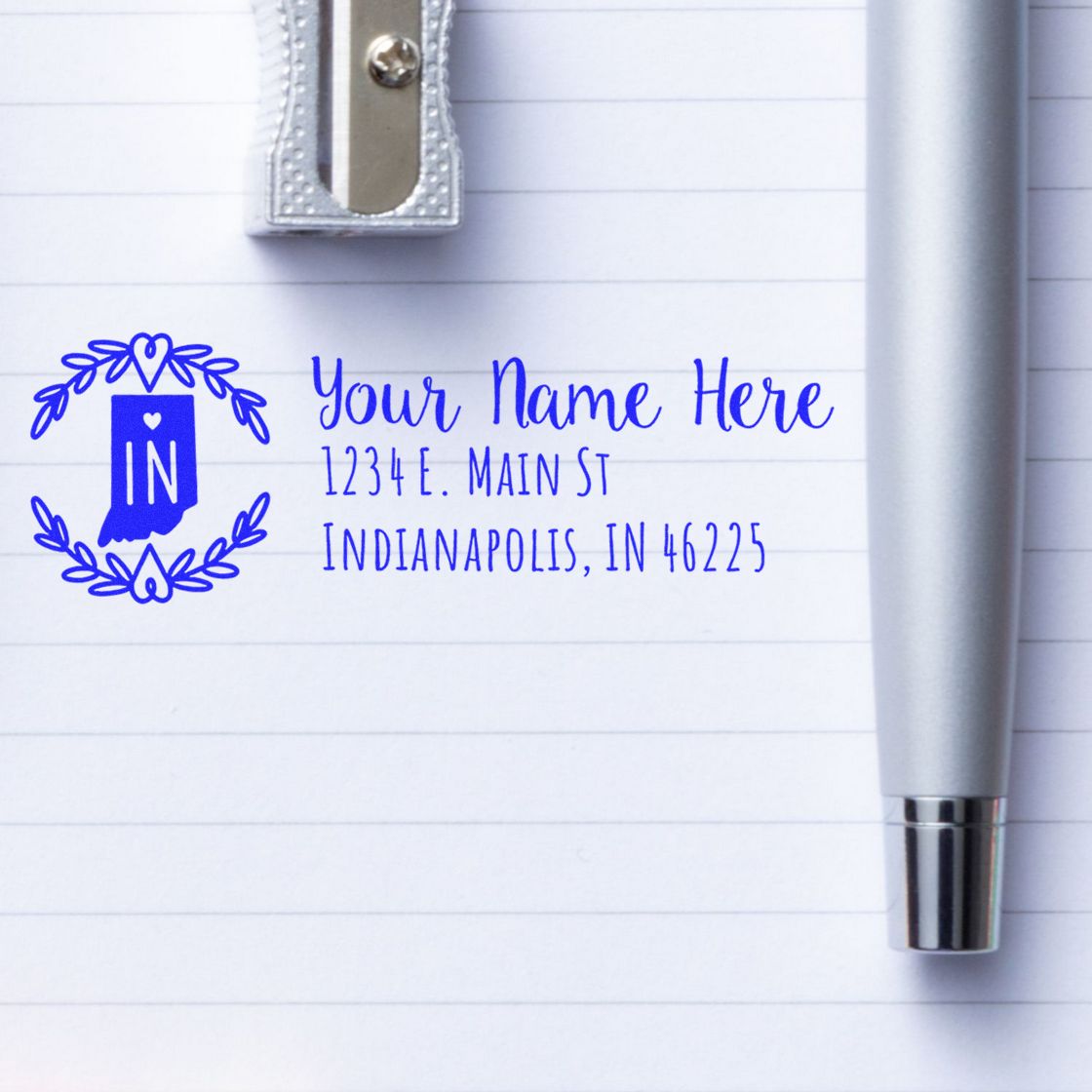 Custom Indiana return address rubber stamp with floral IN design and personalized name, street address, and ZIP code.