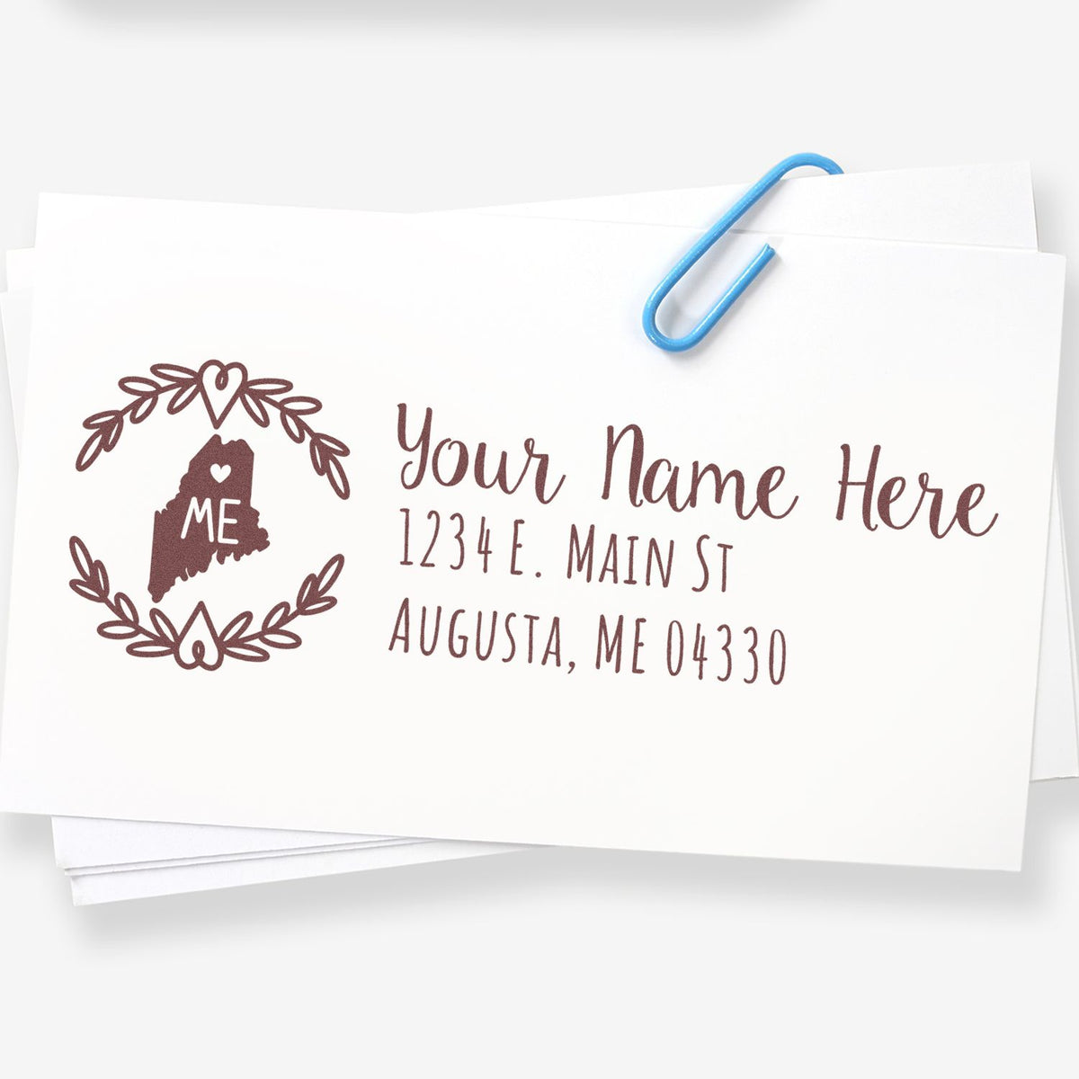 Personalized Maine address rubber stamp with floral wreath design for envelopes, wedding stationery, and mailing.