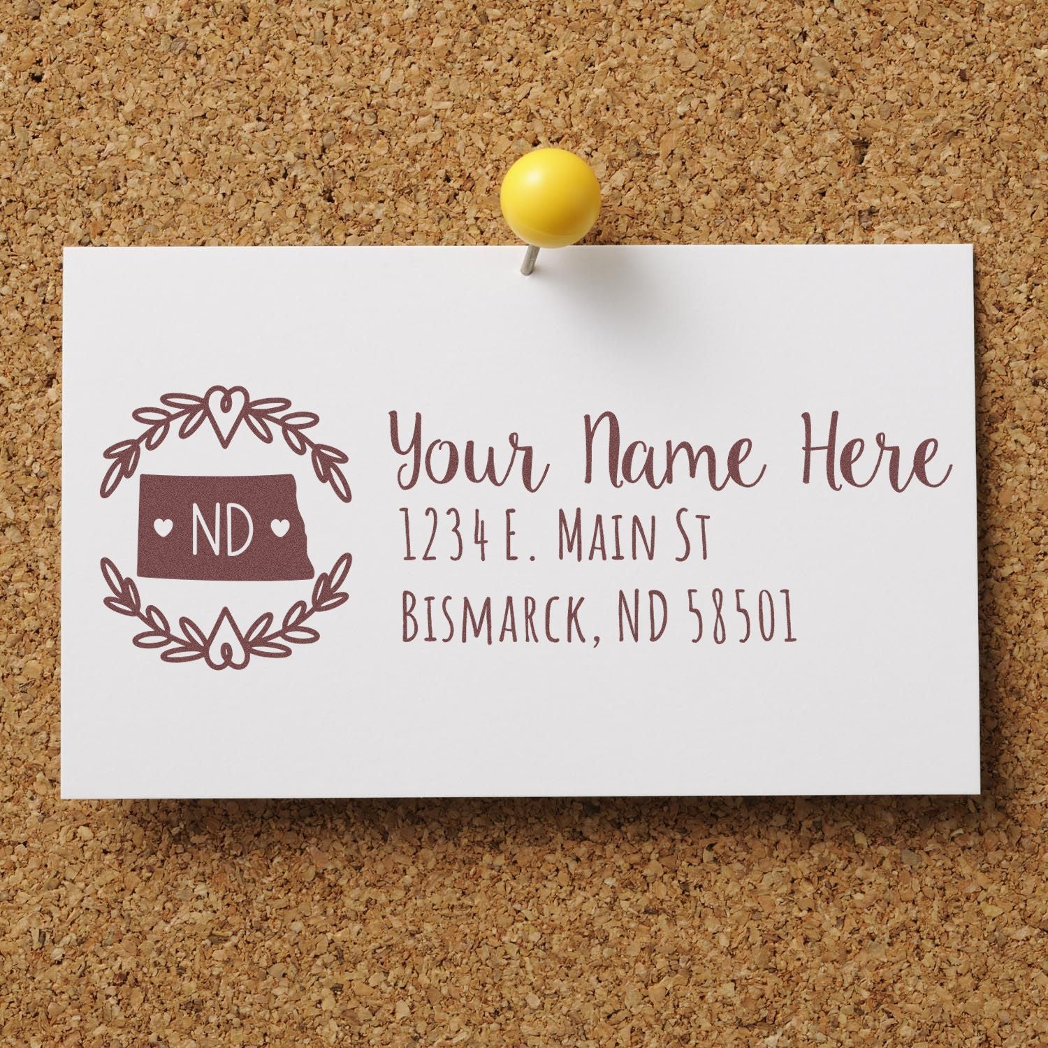 Personalized return address rubber stamp featuring North Dakota state design, name, street address, and ZIP code.