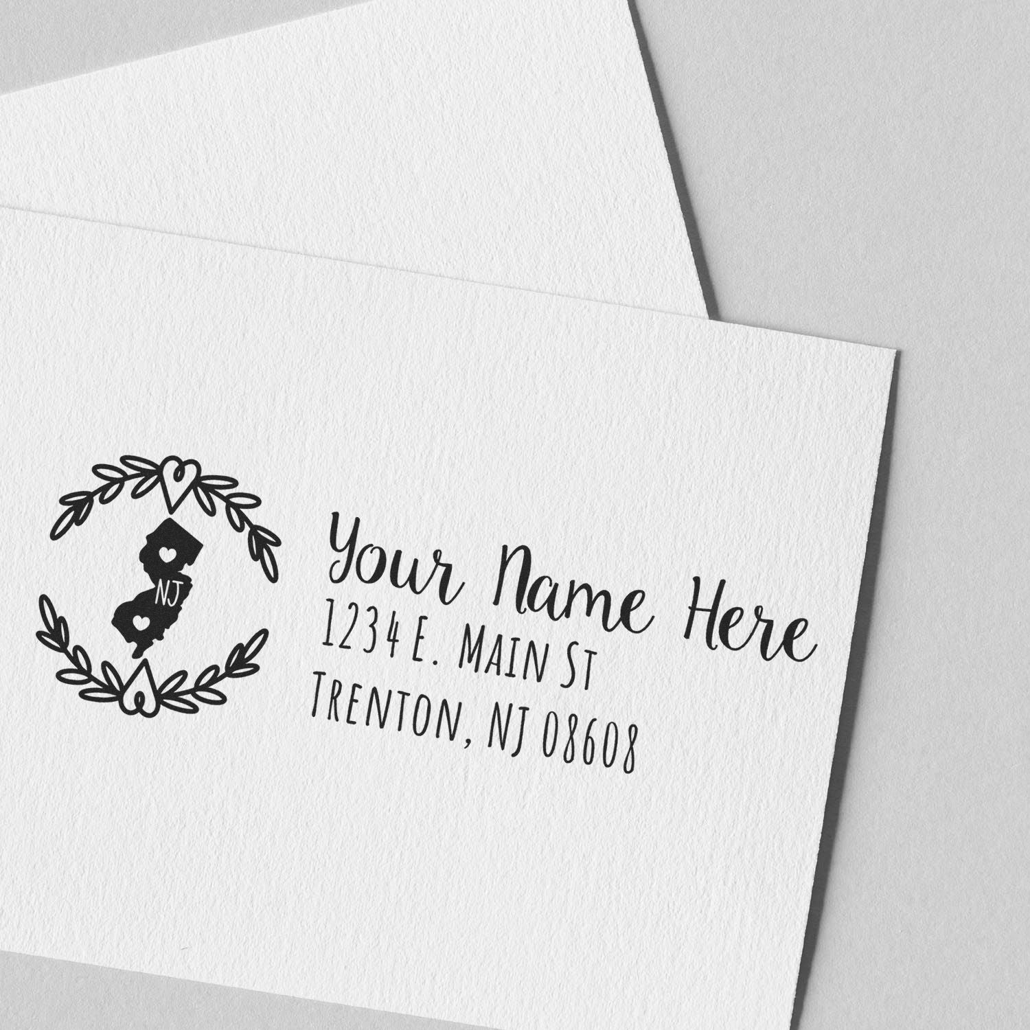 Custom return address rubber stamp with floral wreath and New Jersey design for personalized envelopes