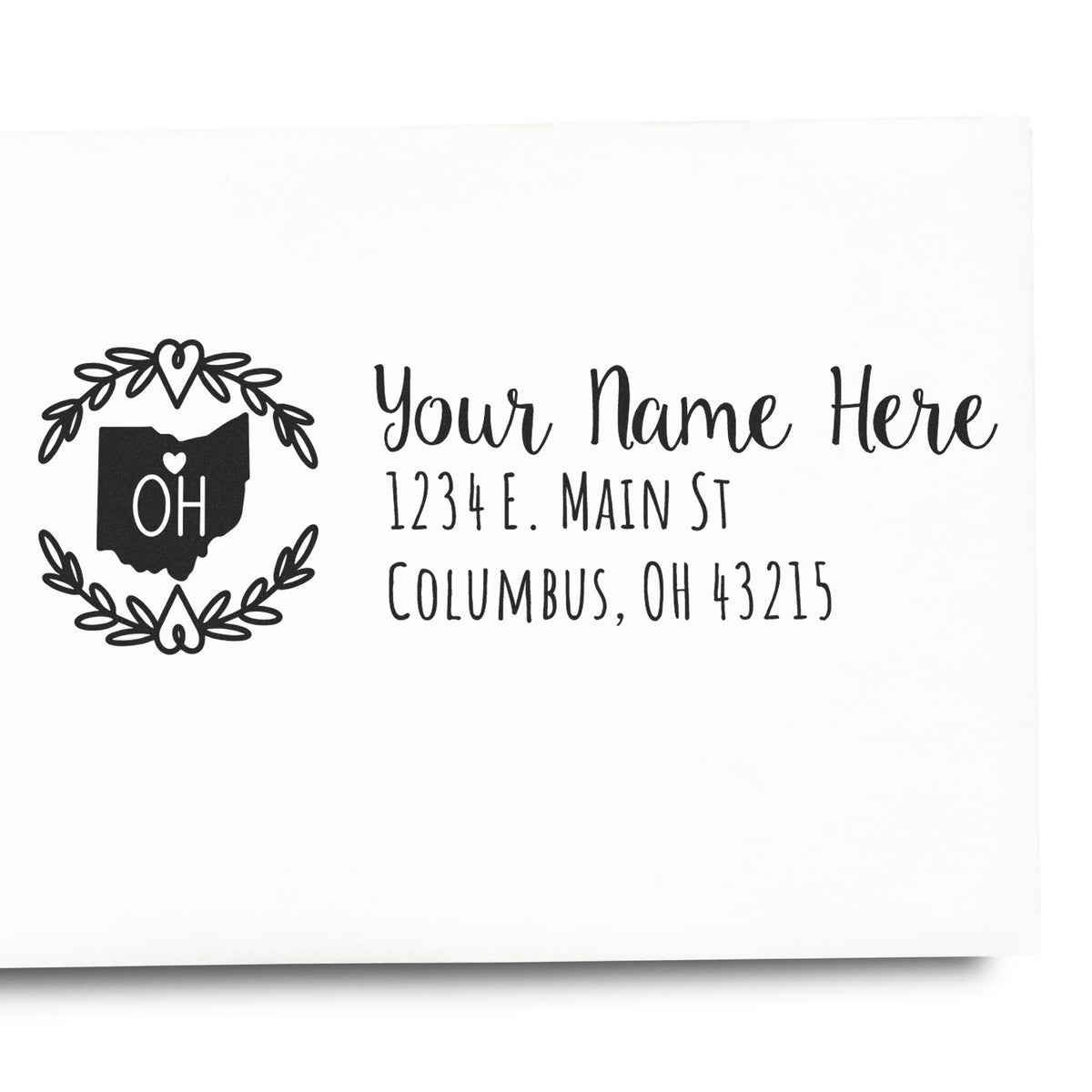 Personalized Ohio return address rubber stamp with name and address, featuring a state outline and floral wreath design.