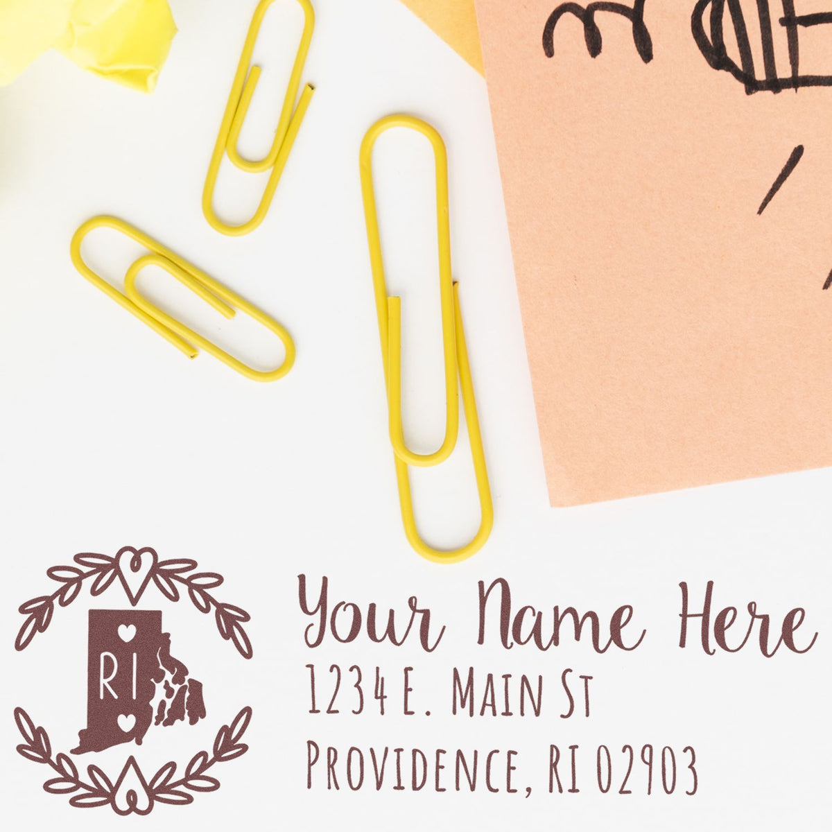 Custom return address rubber stamp with Rhode Island monogram, name, street address, and ZIP code on envelope mockup.