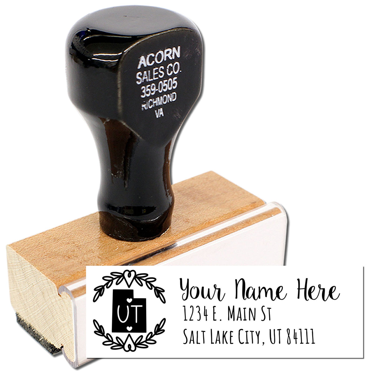 Personalized rubber address stamp with custom name, Salt Lake City UT address, and decorative monogram for mailing labels.