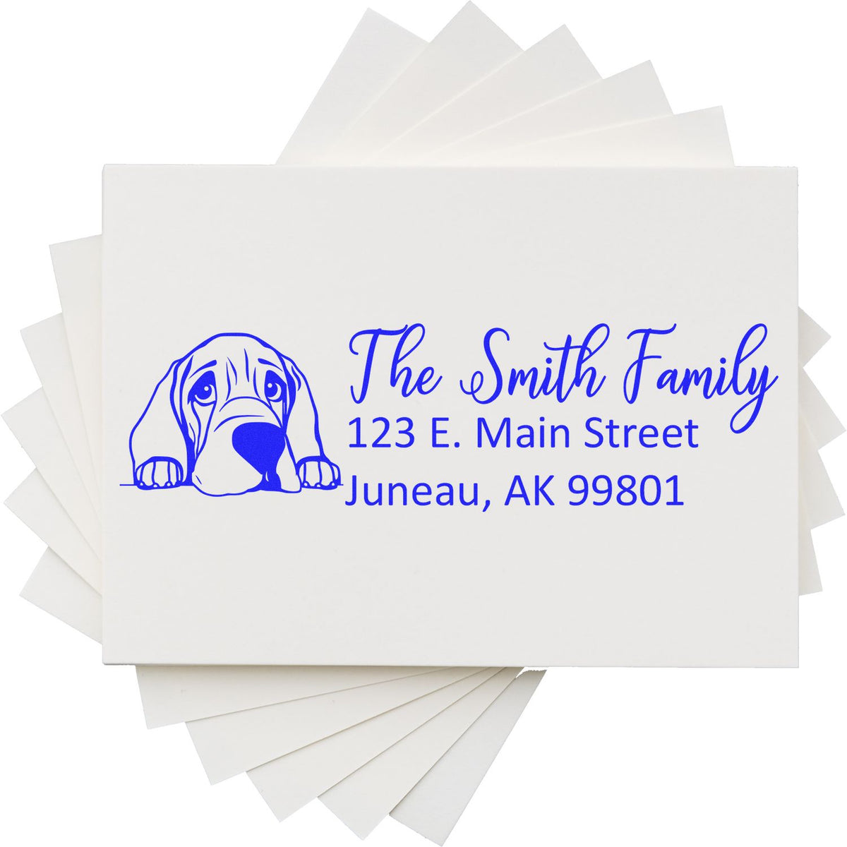 Custom family return address rubber stamp with dog illustration for The Smith Family, Juneau, AK 99801.