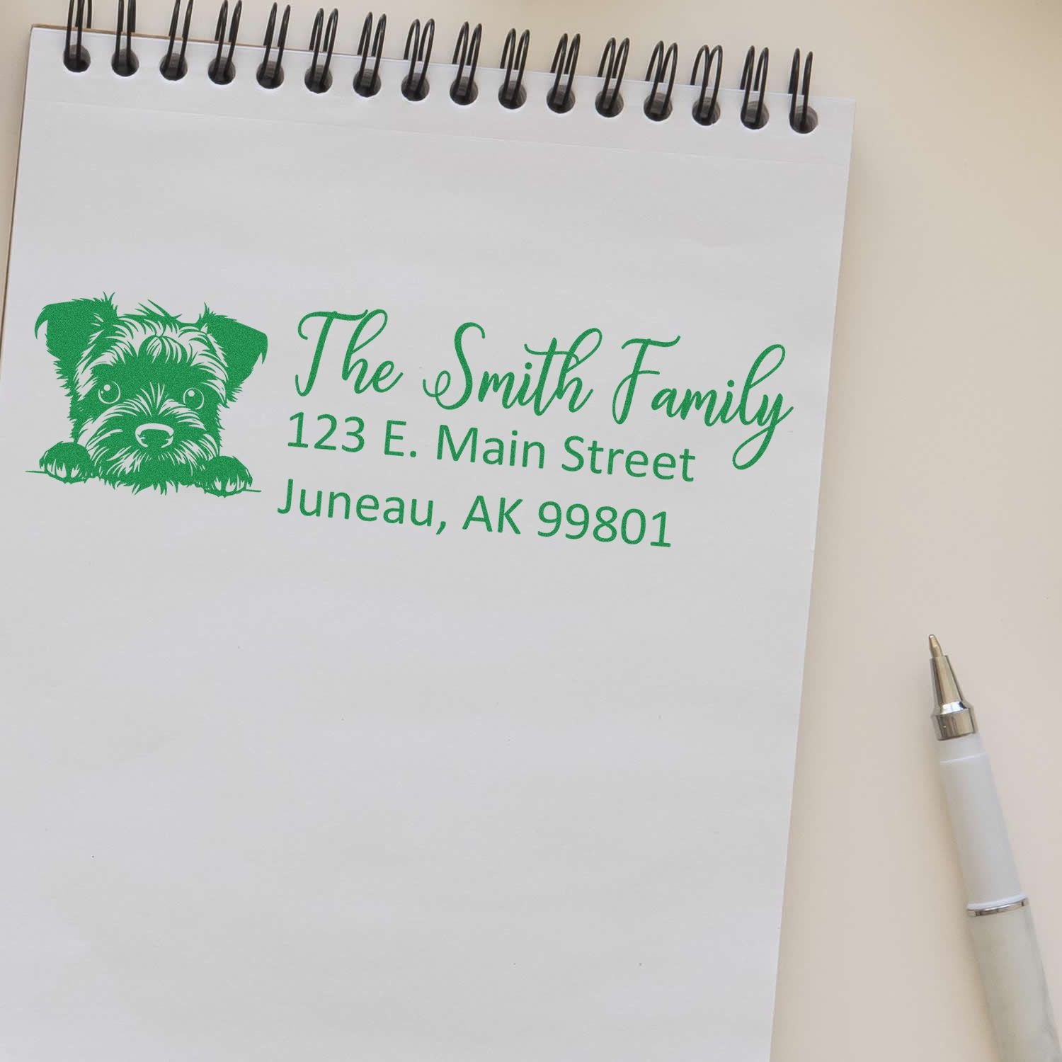 Personalized dog return address rubber stamp for The Smith Family, Juneau, AK 99801.