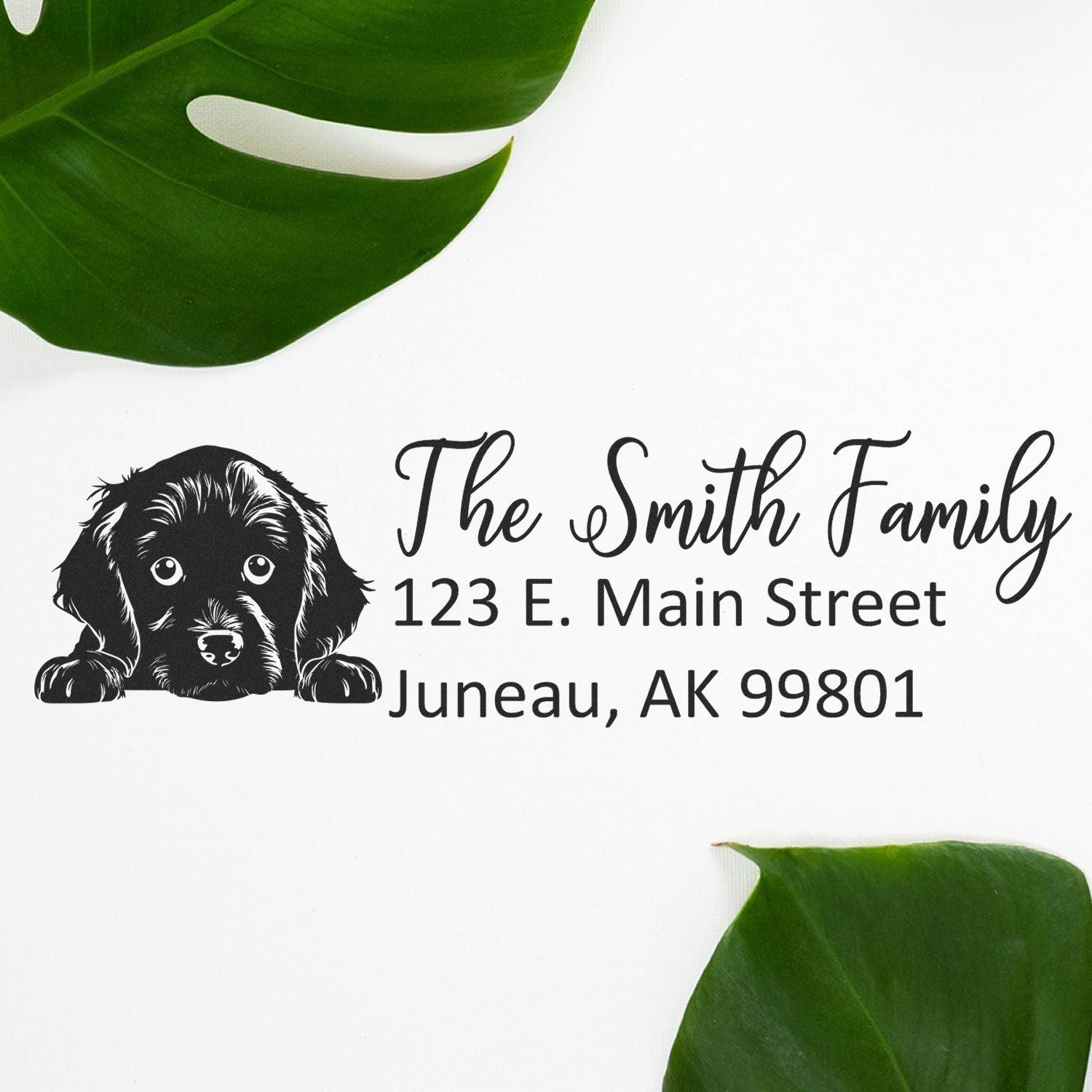 Personalized return address rubber stamp with dog design for The Smith Family, Juneau, AK 99801.