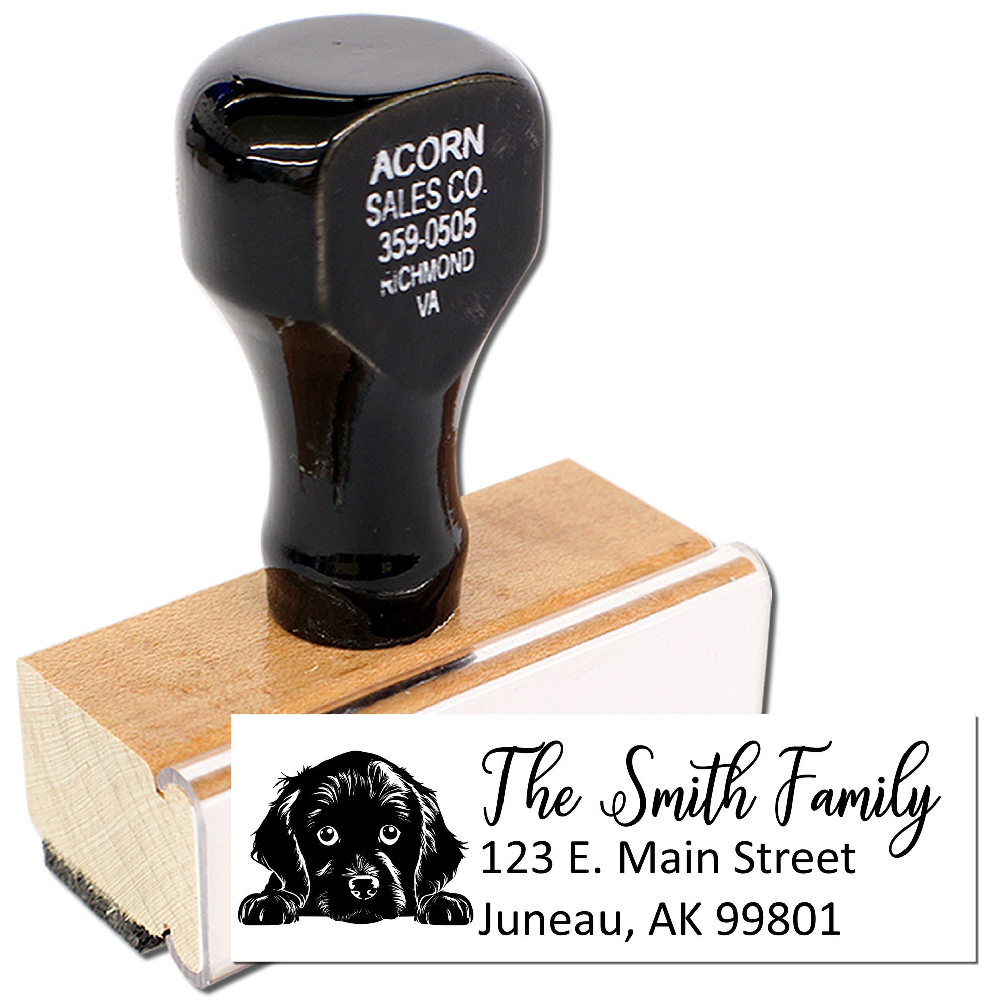 Custom rubber address stamp with dog logo and family mailing address for envelopes and stationery.