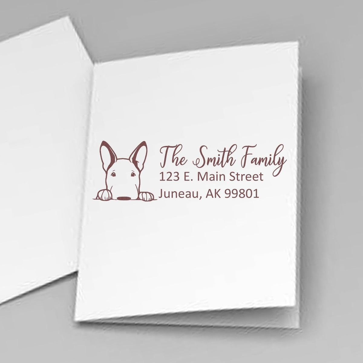 Custom dog return address rubber stamp for The Smith Family, with Juneau, AK mailing address.
