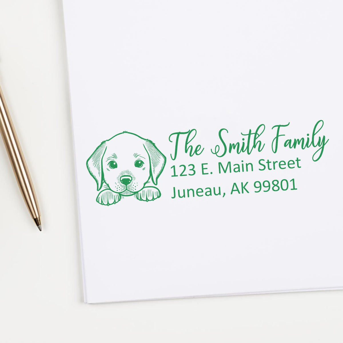 Personalized rubber stamp with puppy illustration and return address for The Smith Family, Juneau, AK 99801