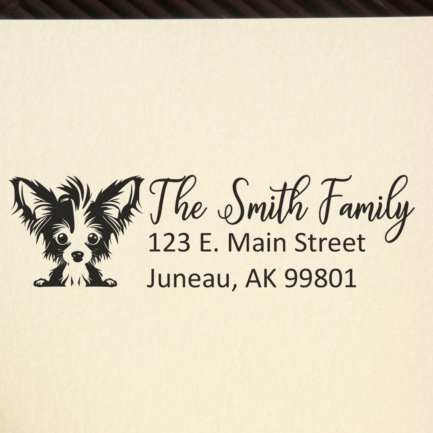 Personalized family return address rubber stamp with dog graphic, The Smith Family, 123 E. Main Street, Juneau, AK 99801.