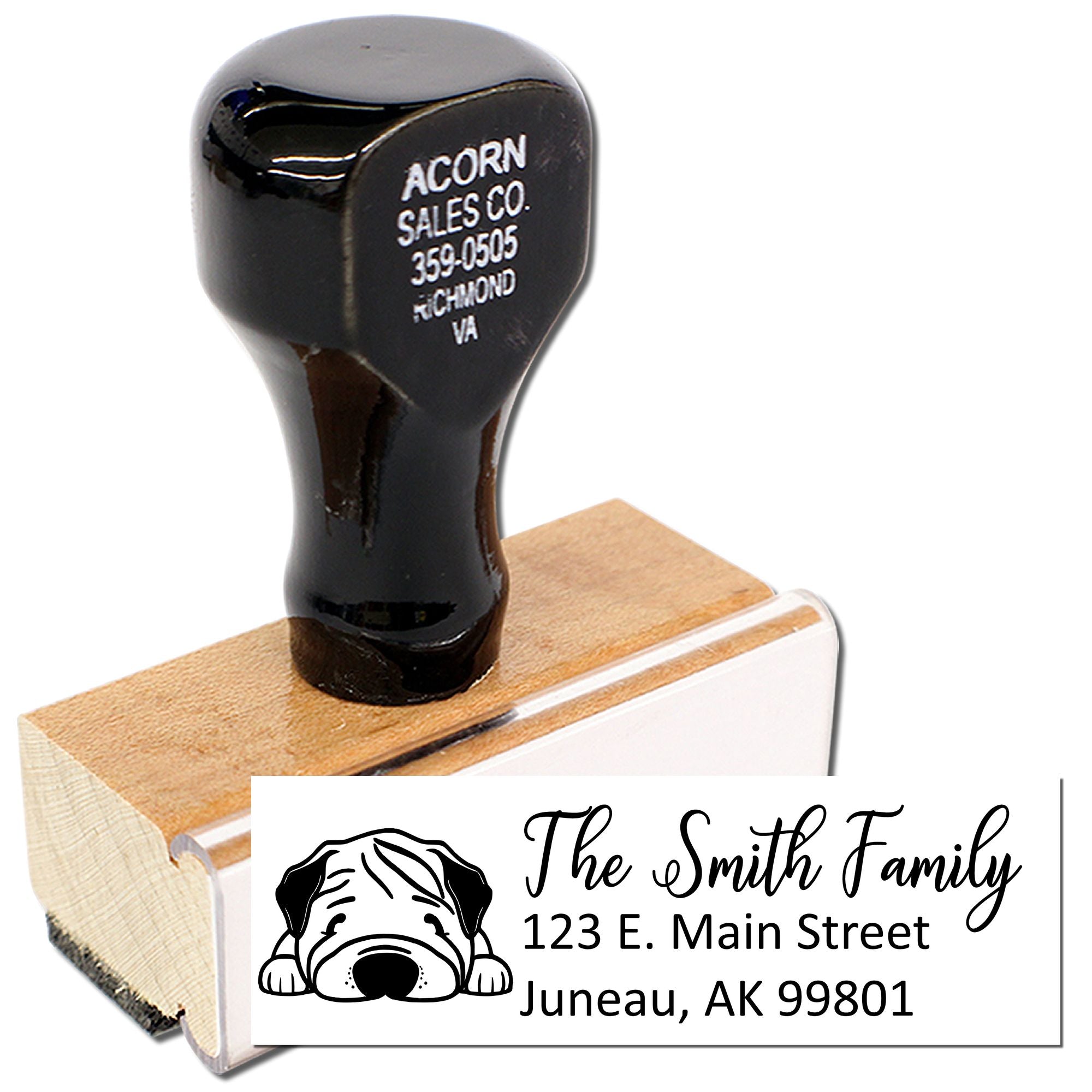 Custom address rubber stamp with dog logo, family name and return address for personalized mailing and envelopes.