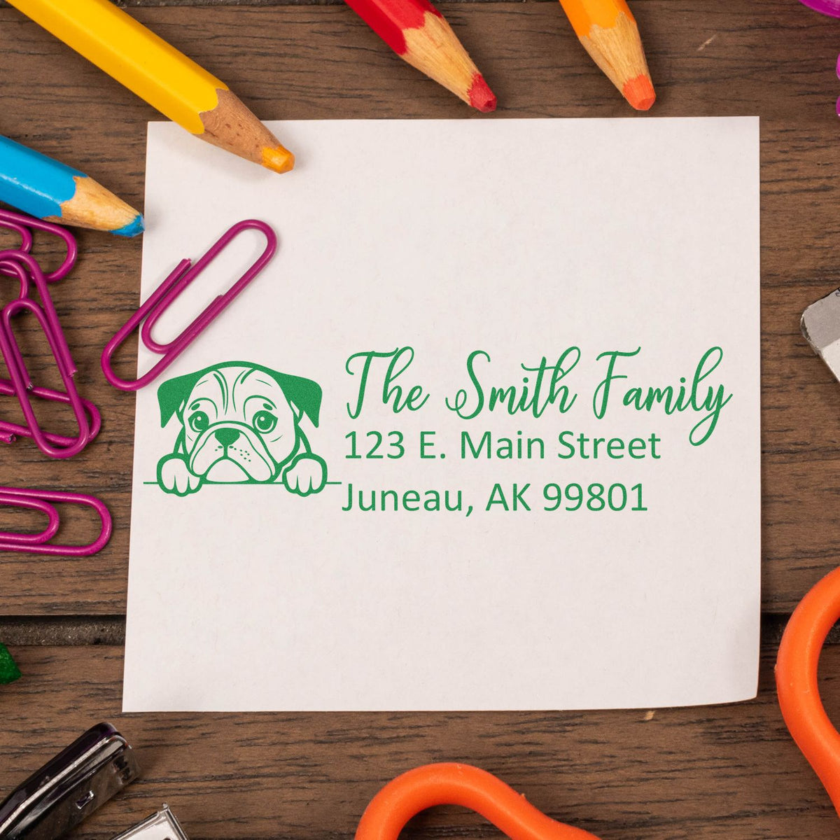 Custom rubber address stamp with bulldog icon for The Smith Family, 123 E. Main Street, Juneau, AK 99801
