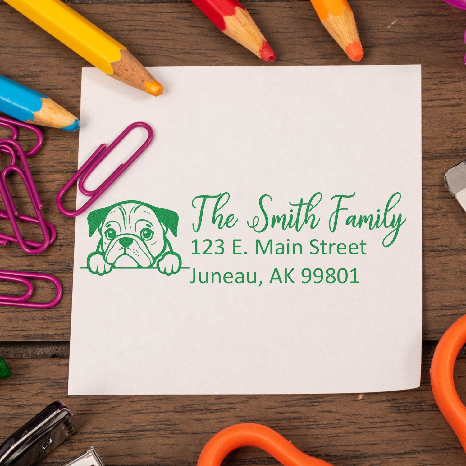 Custom return address rubber stamp with bulldog design for The Smith Family, 123 E. Main Street, Juneau, AK 99801.
