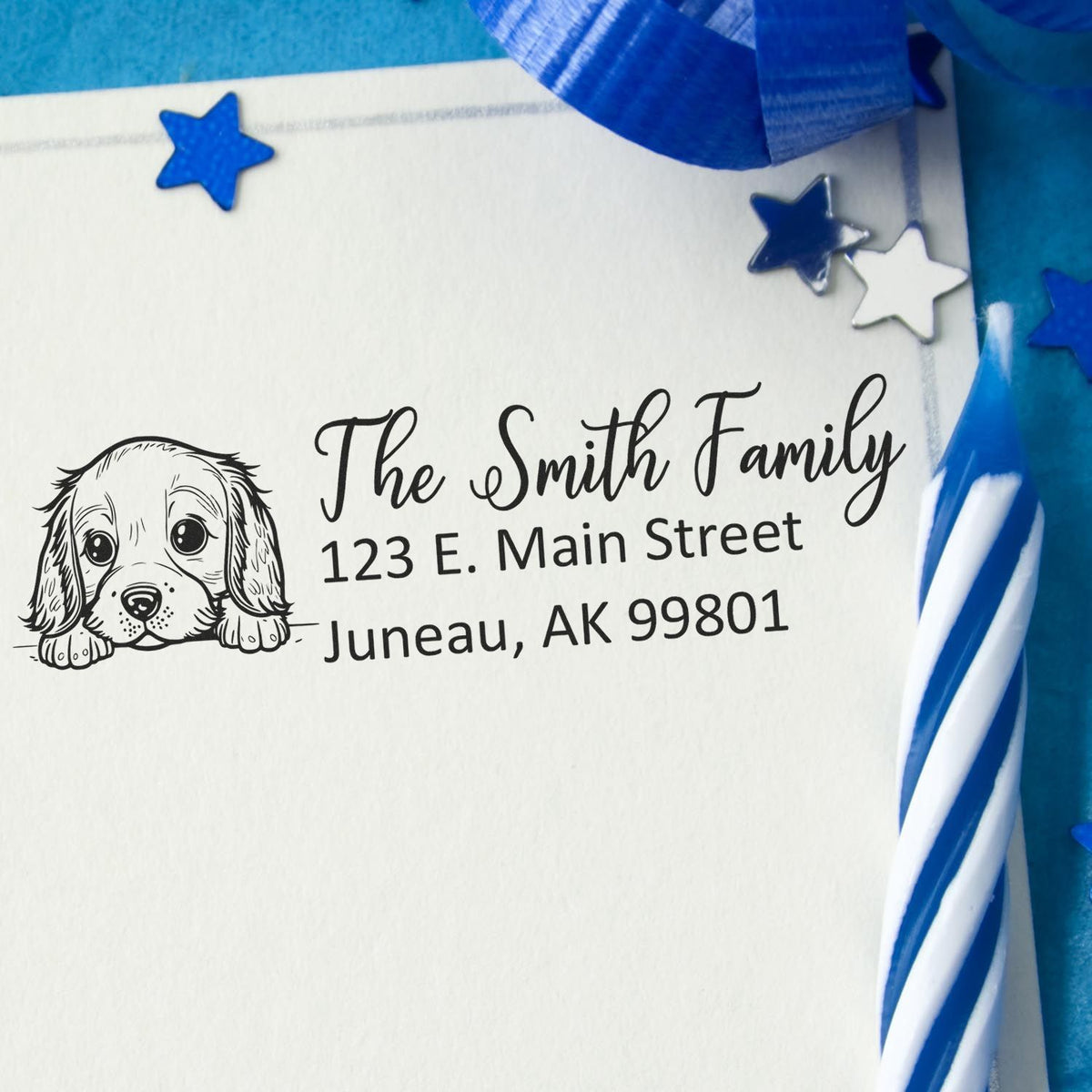 Personalized return address rubber stamp with dog illustration for The Smith Family, custom envelope and card branding.