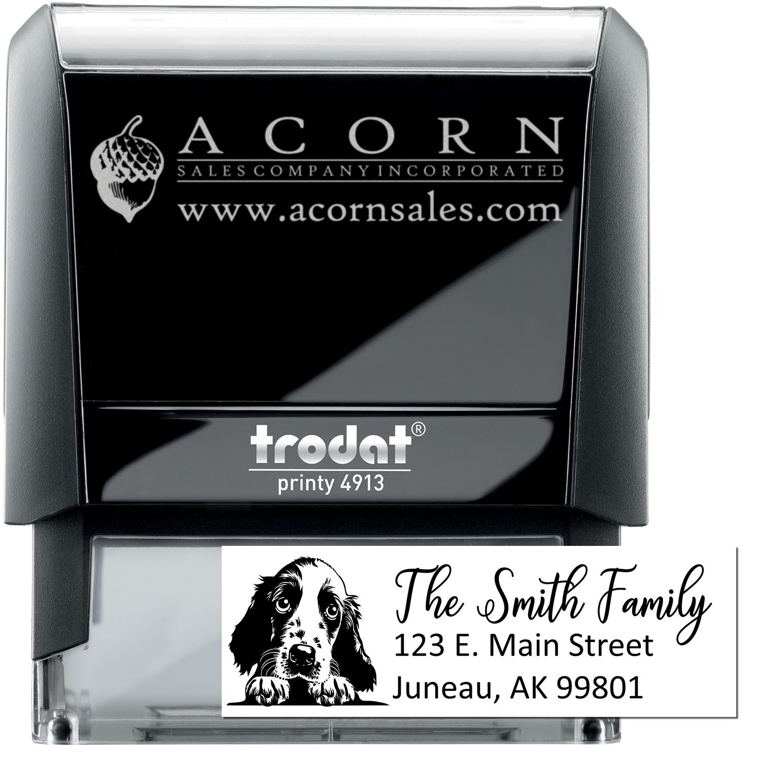 Custom self-inking rubber address stamp with dog logo, family name, street address, and Trodat Printy 4913 branding.