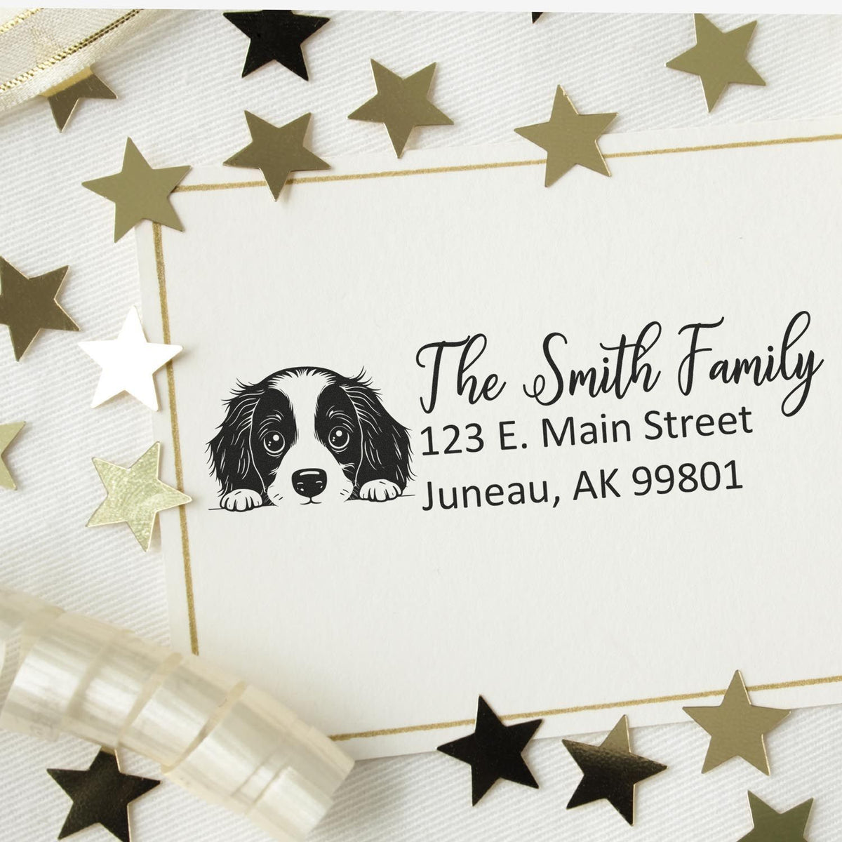 Custom rubber stamp with dog illustration and return address for The Smith Family, perfect for personalized mailing envelopes.
