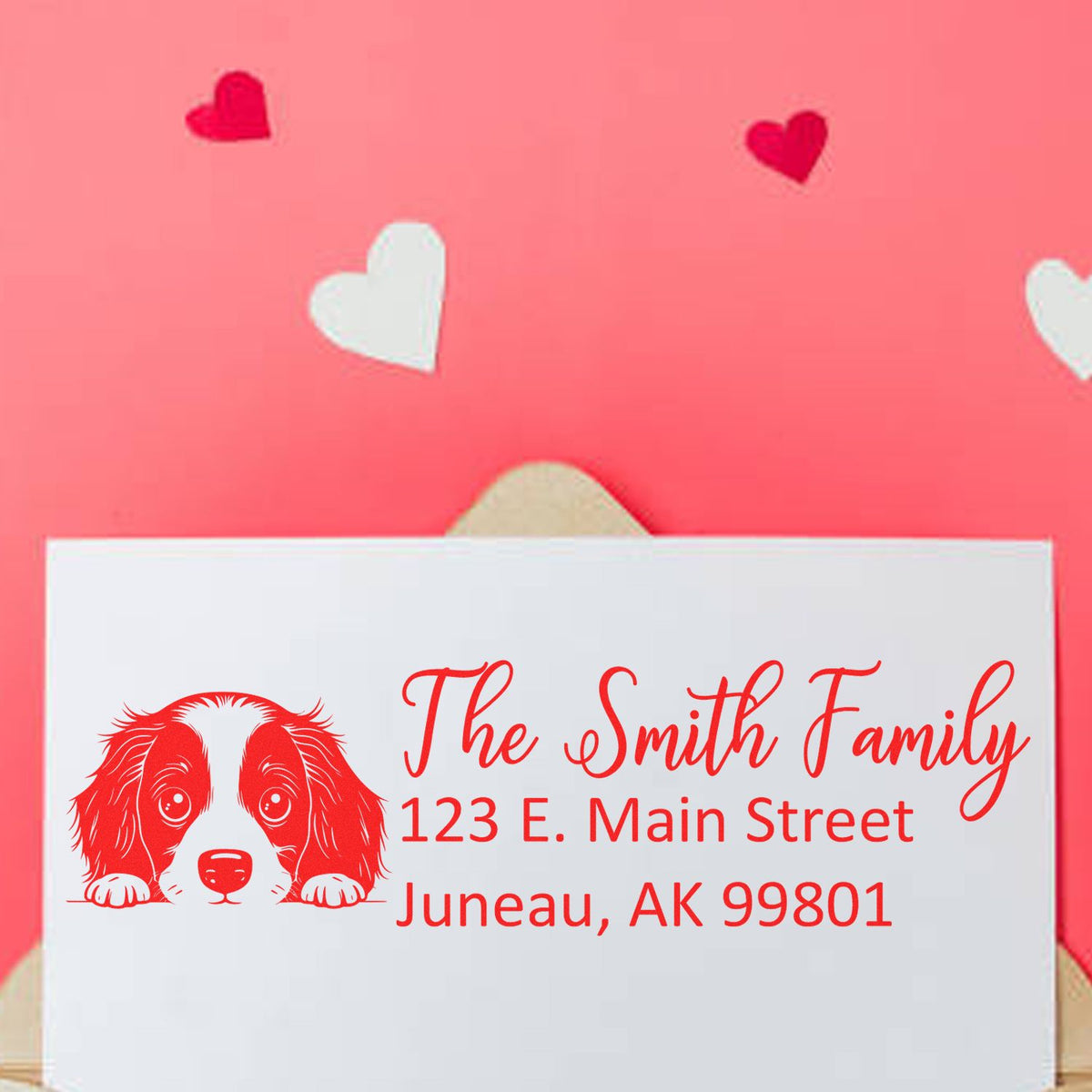 Custom dog return address rubber stamp with family name and Juneau, AK address, perfect for pet lovers and personalized mail.