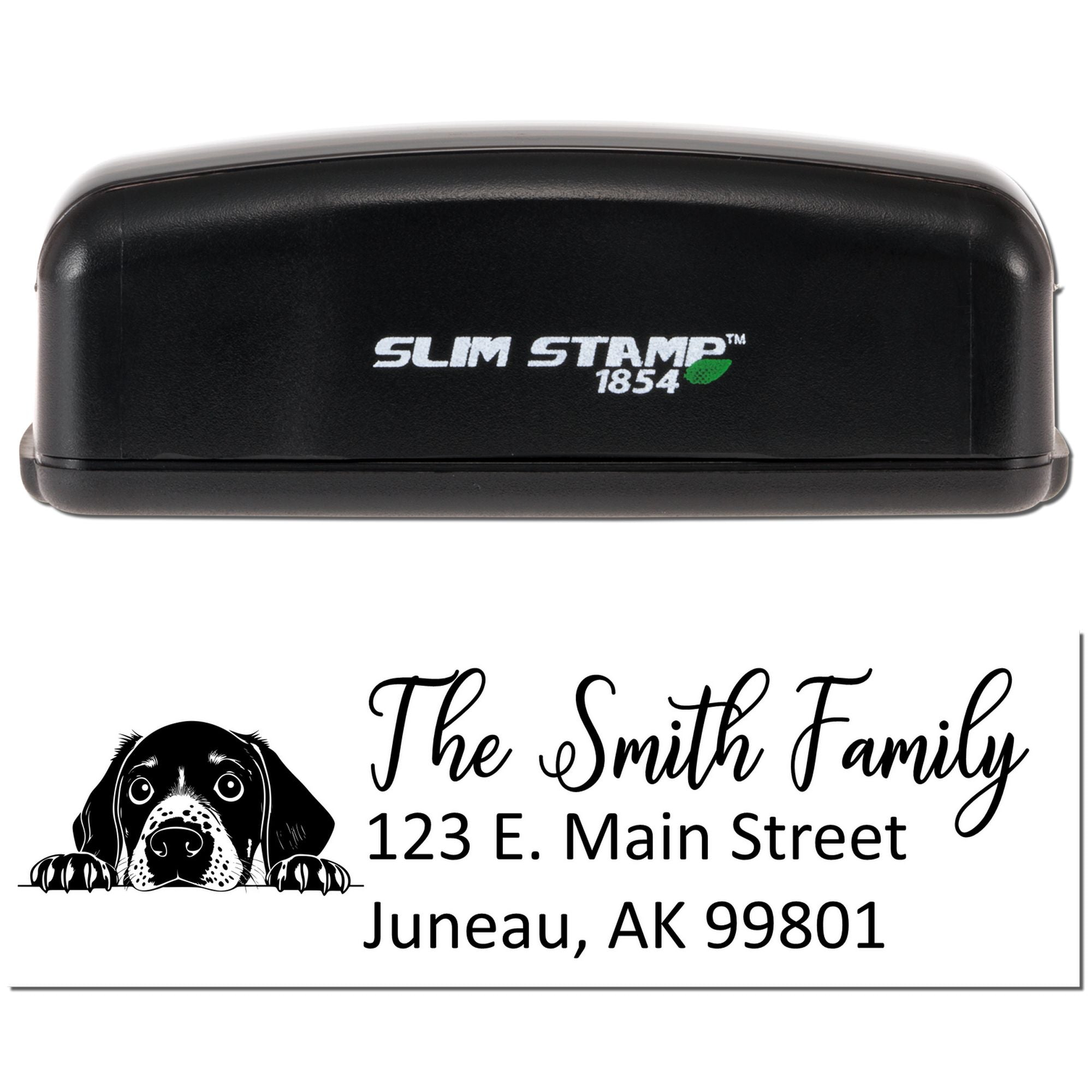 Custom self-inking rubber address stamp with dog design for The Smith Family, Juneau, AK 99801.