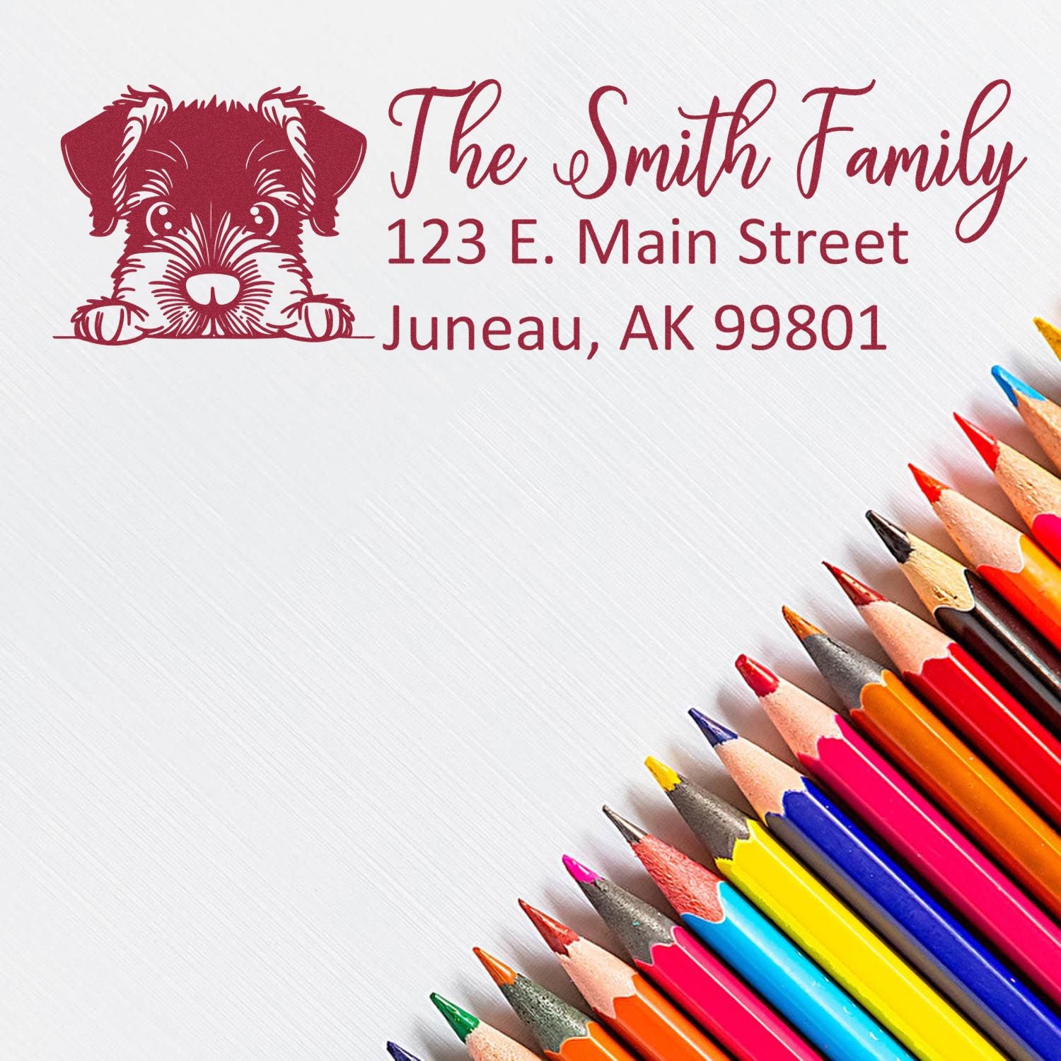 Personalized dog return address rubber stamp for The Smith Family, Juneau, AK 99801.