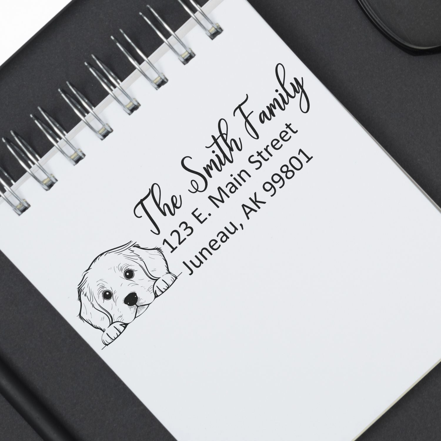 Custom family address rubber stamp design with puppy illustration for personalized return mail and envelopes