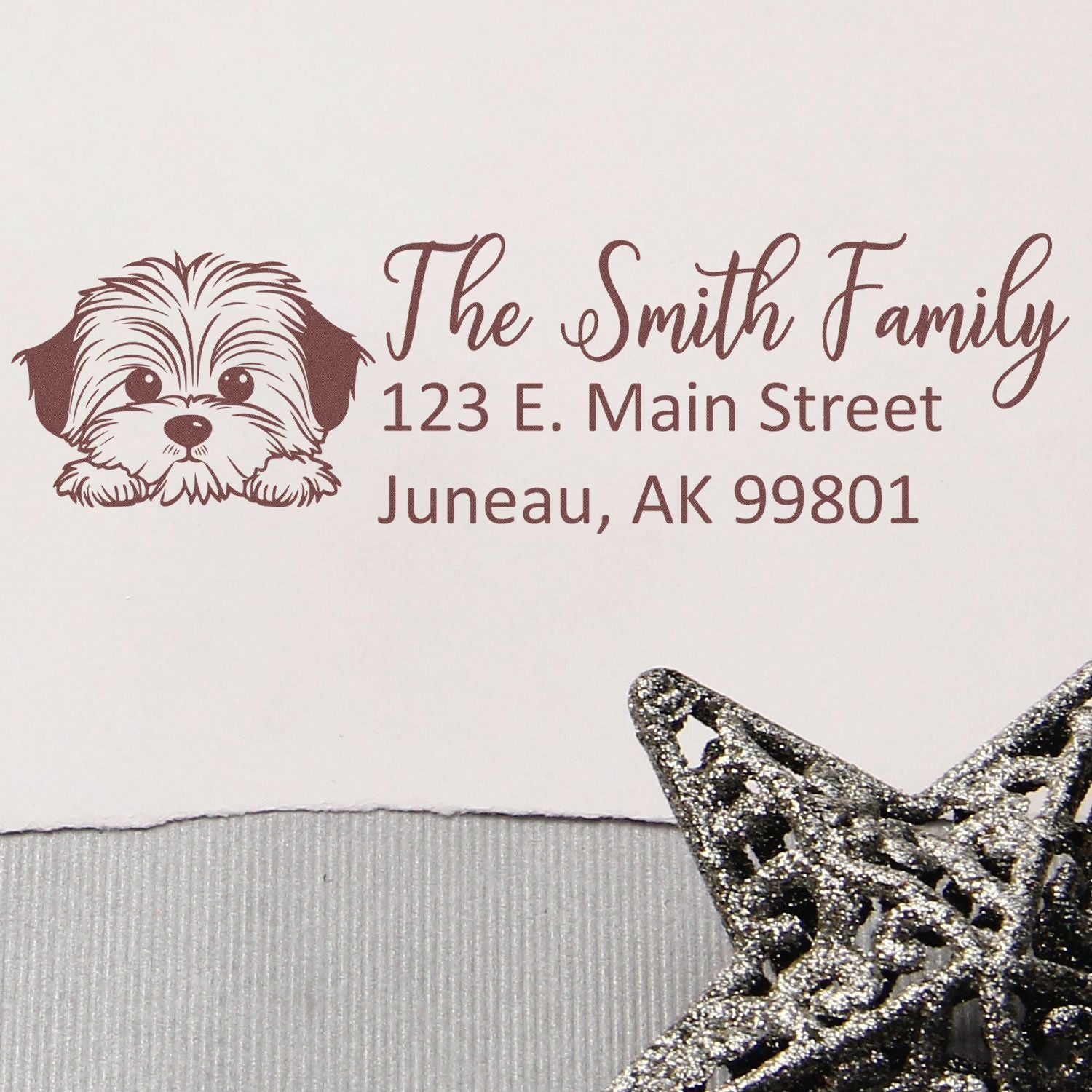 Personalized rubber return address stamp with dog illustration for The Smith Family, Juneau, AK.
