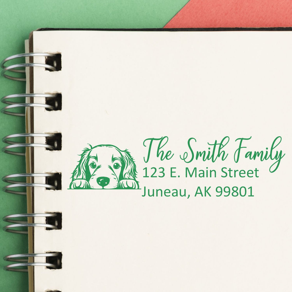 Personalized return address rubber stamp with dog illustration for The Smith Family, 123 E. Main Street, Juneau, AK 99801