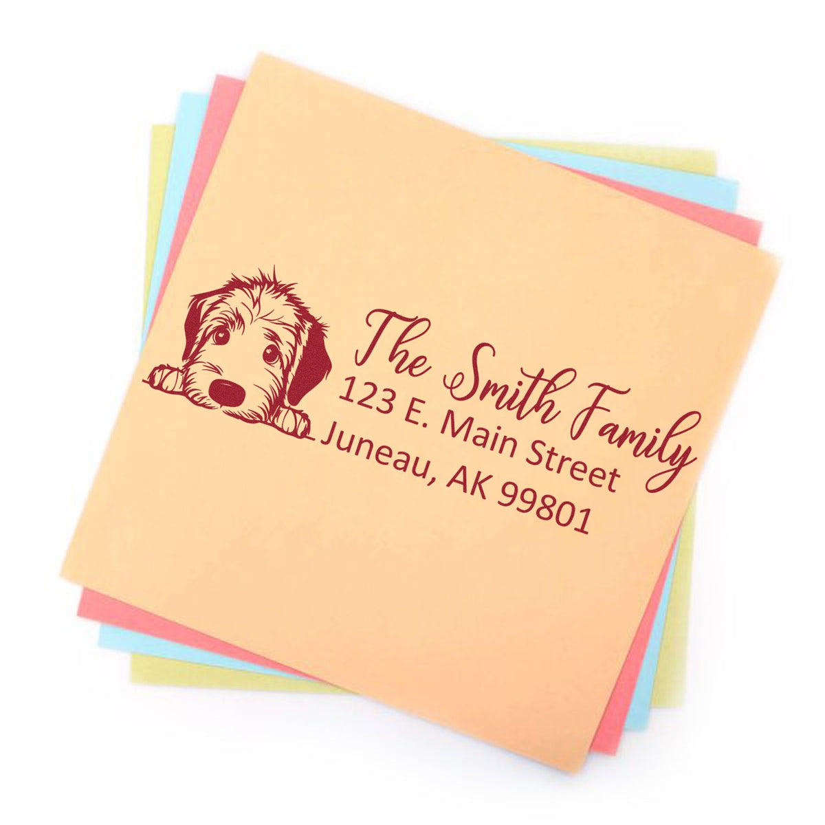 Personalized dog return address rubber stamp for The Smith Family on pastel stationery.