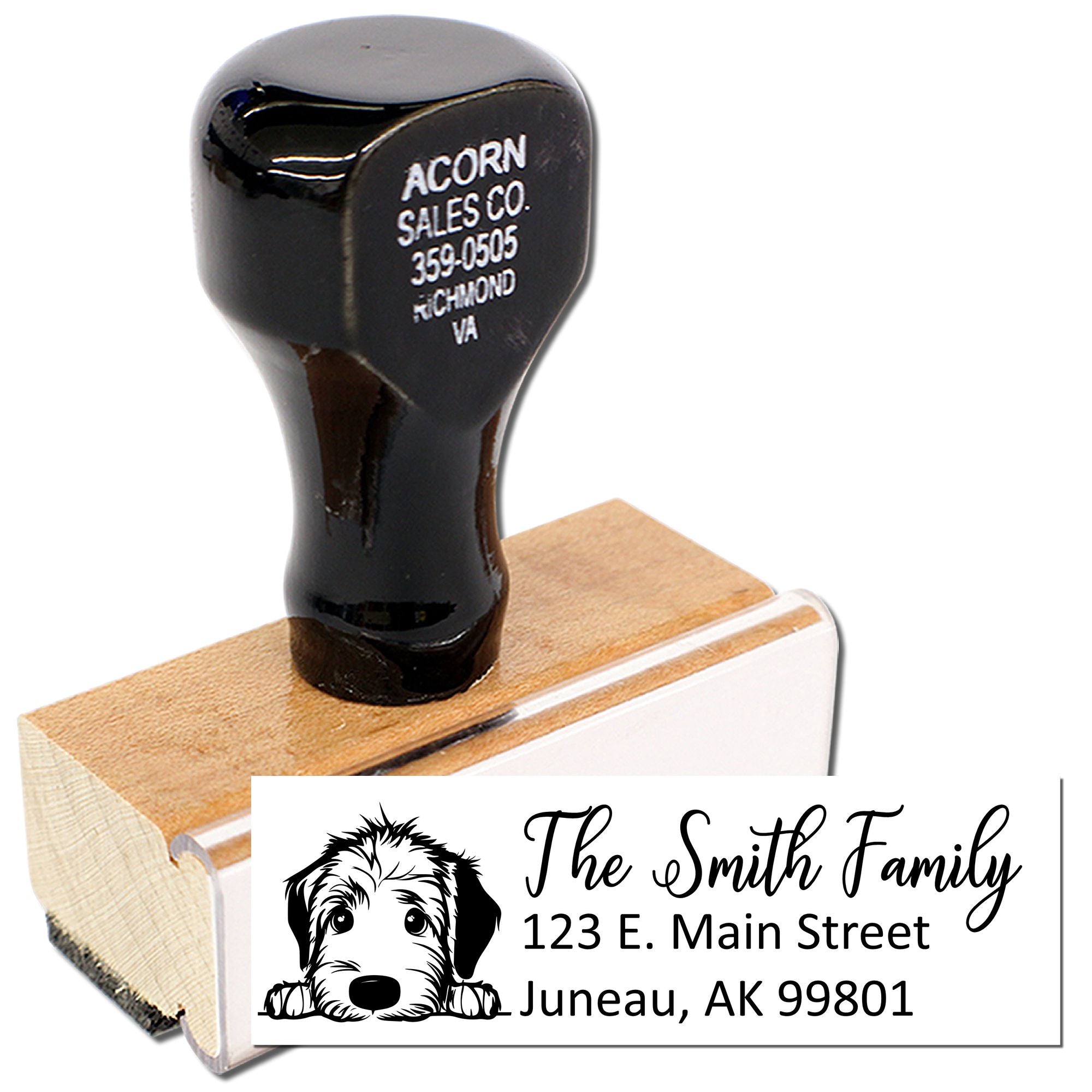 Custom return address rubber stamp with dog logo, personalized family name, and mailing address imprint.