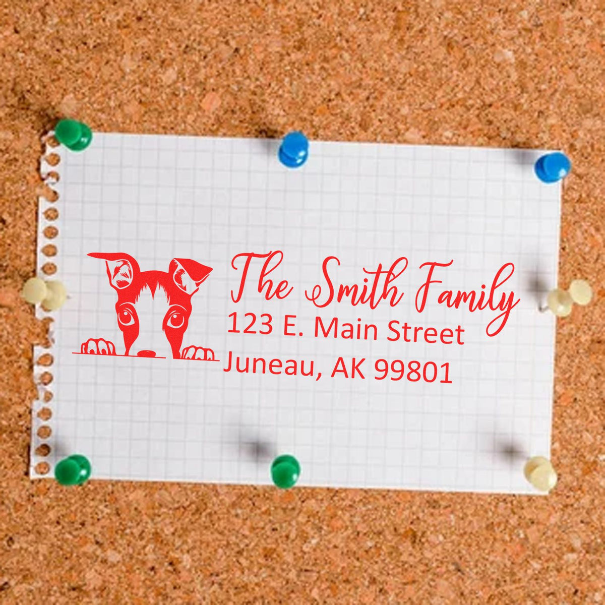 Custom return address rubber stamp with dog illustration, The Smith Family name, and Juneau, AK address.