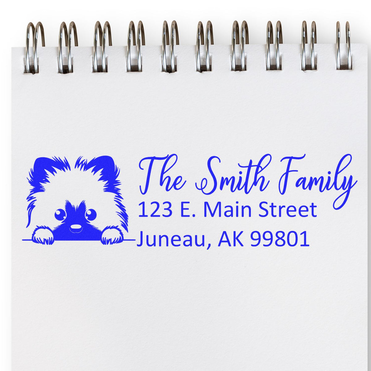 Custom return address rubber stamp for The Smith Family, featuring a pet logo and Juneau, AK mailing address.