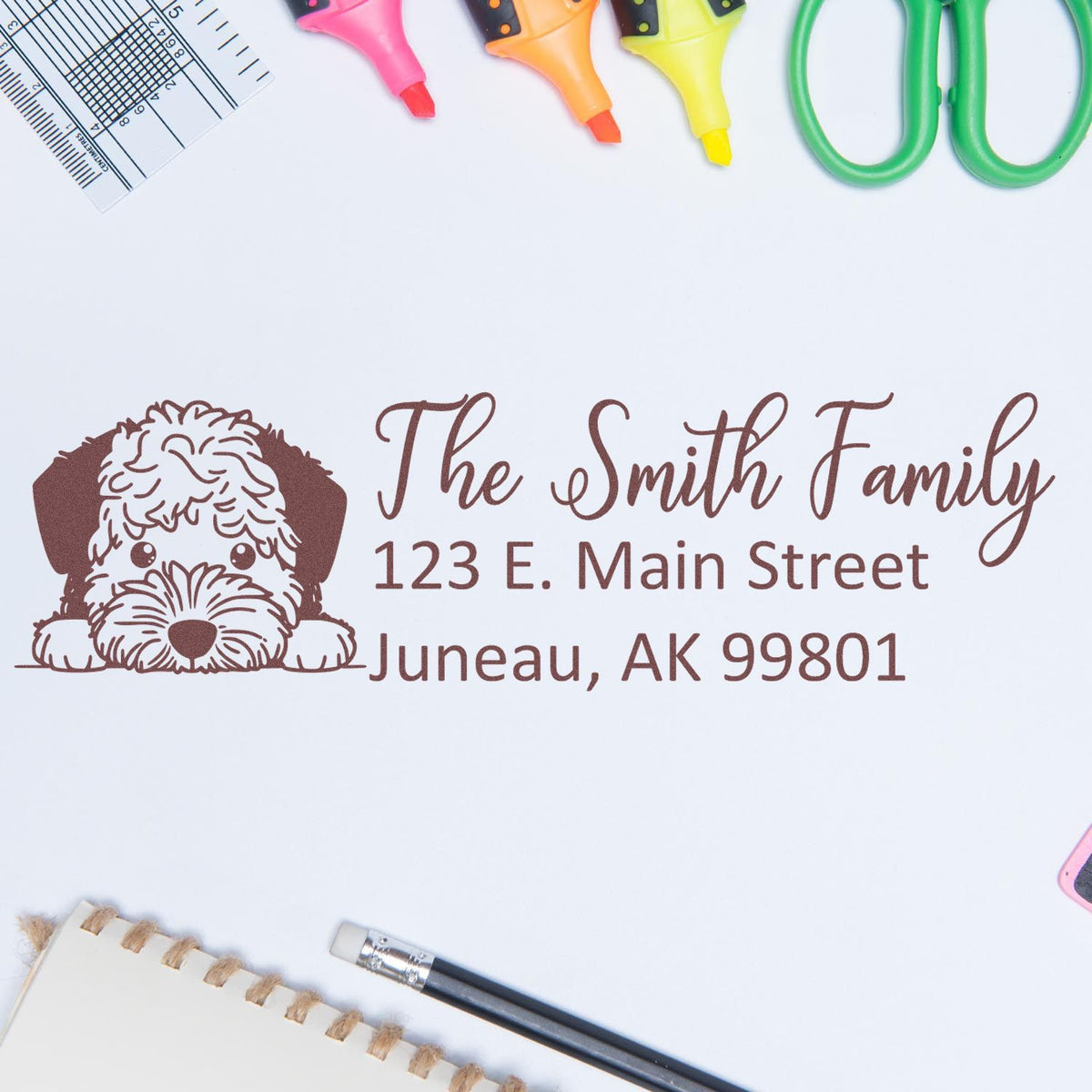 Custom address rubber stamp with dog illustration for The Smith Family, 123 E. Main Street, Juneau, AK 99801