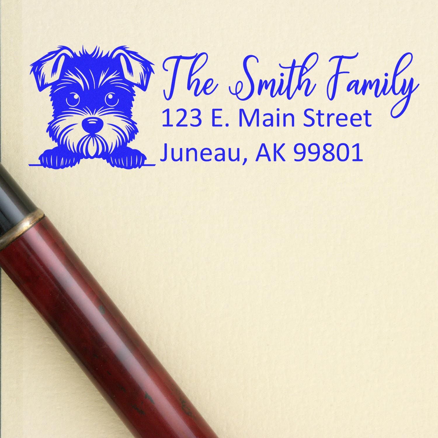 Personalized return address rubber stamp with dog illustration for The Smith Family, Juneau, AK.