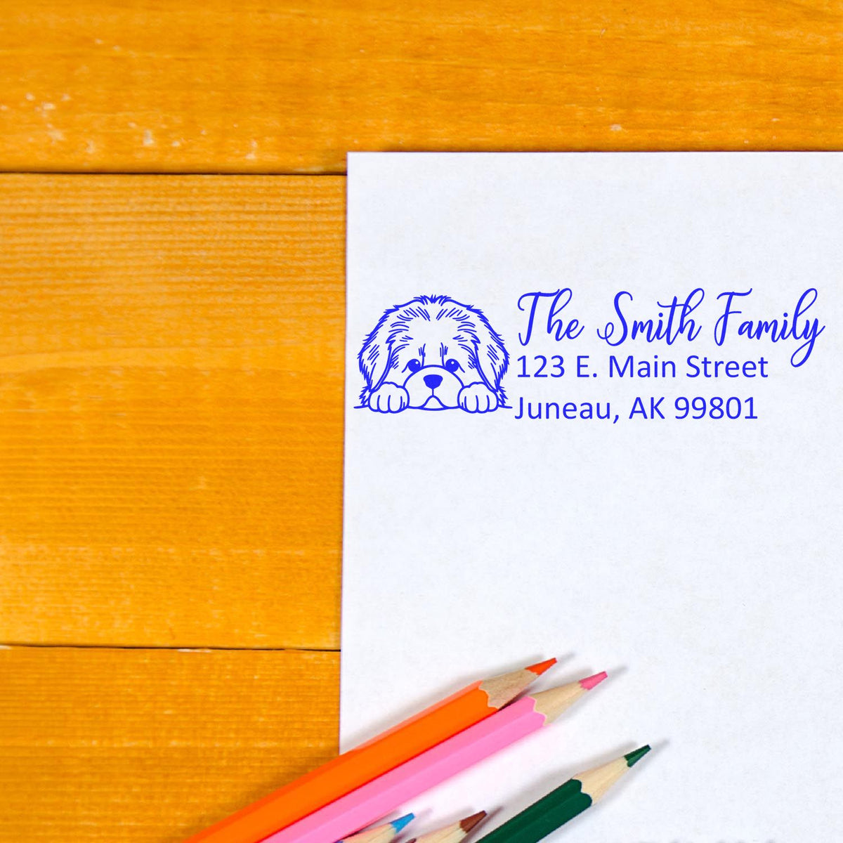 Personalized return address rubber stamp with dog design for The Smith Family, Juneau, AK 99801