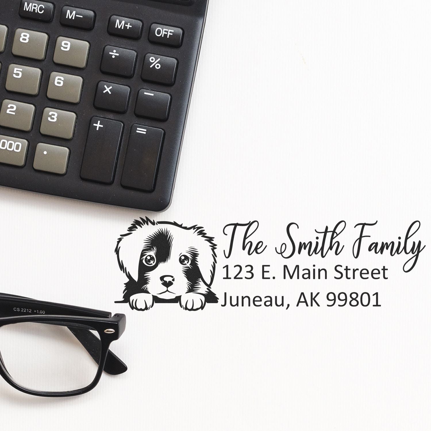 Personalized return address rubber stamp with puppy design and Juneau, AK mailing address for The Smith Family.