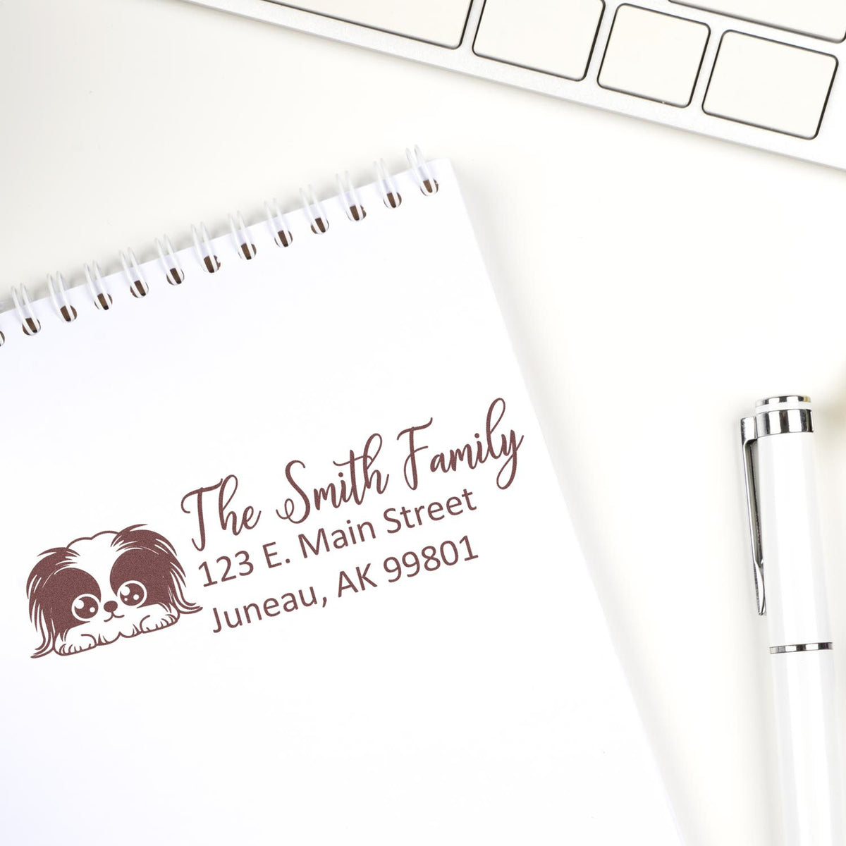 Personalized return address rubber stamp with dog design for The Smith Family, Juneau, AK mail and stationery.