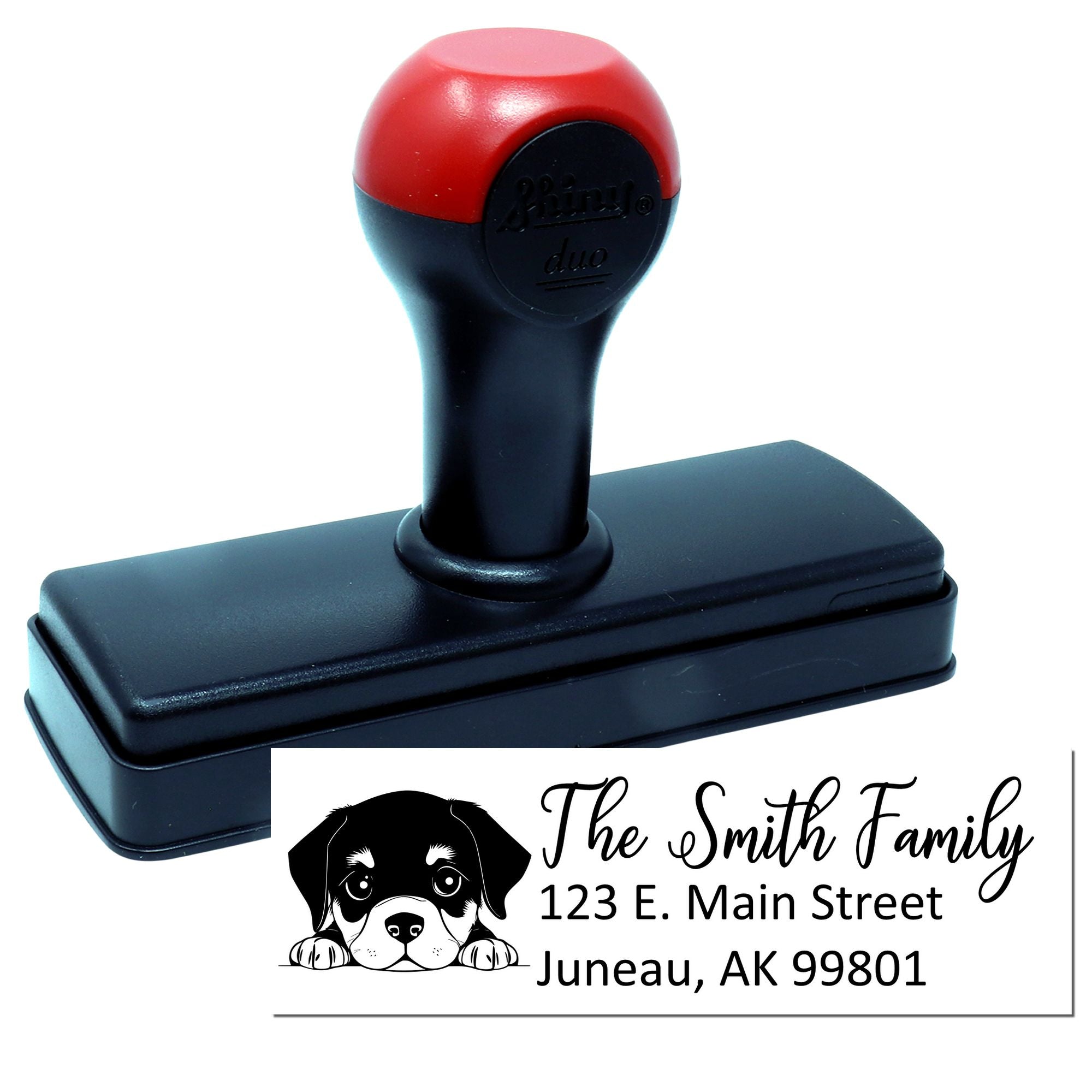 Custom self-inking address rubber stamp with dog design for The Smith Family, 123 E. Main Street, Juneau, AK 99801.