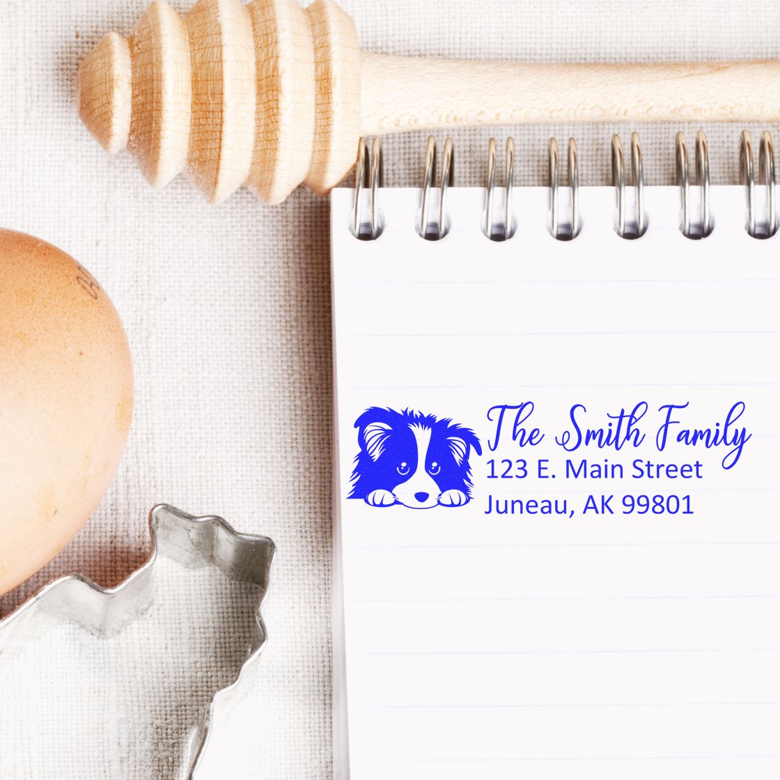 Custom family return address rubber stamp with dog logo for personalized envelopes, crafts, and mailing labels.