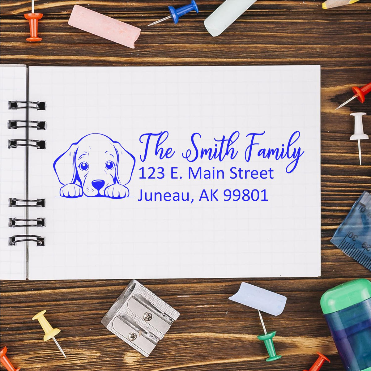Custom return address rubber stamp with dog illustration, The Smith Family name, and mailing address for personalized stationery.