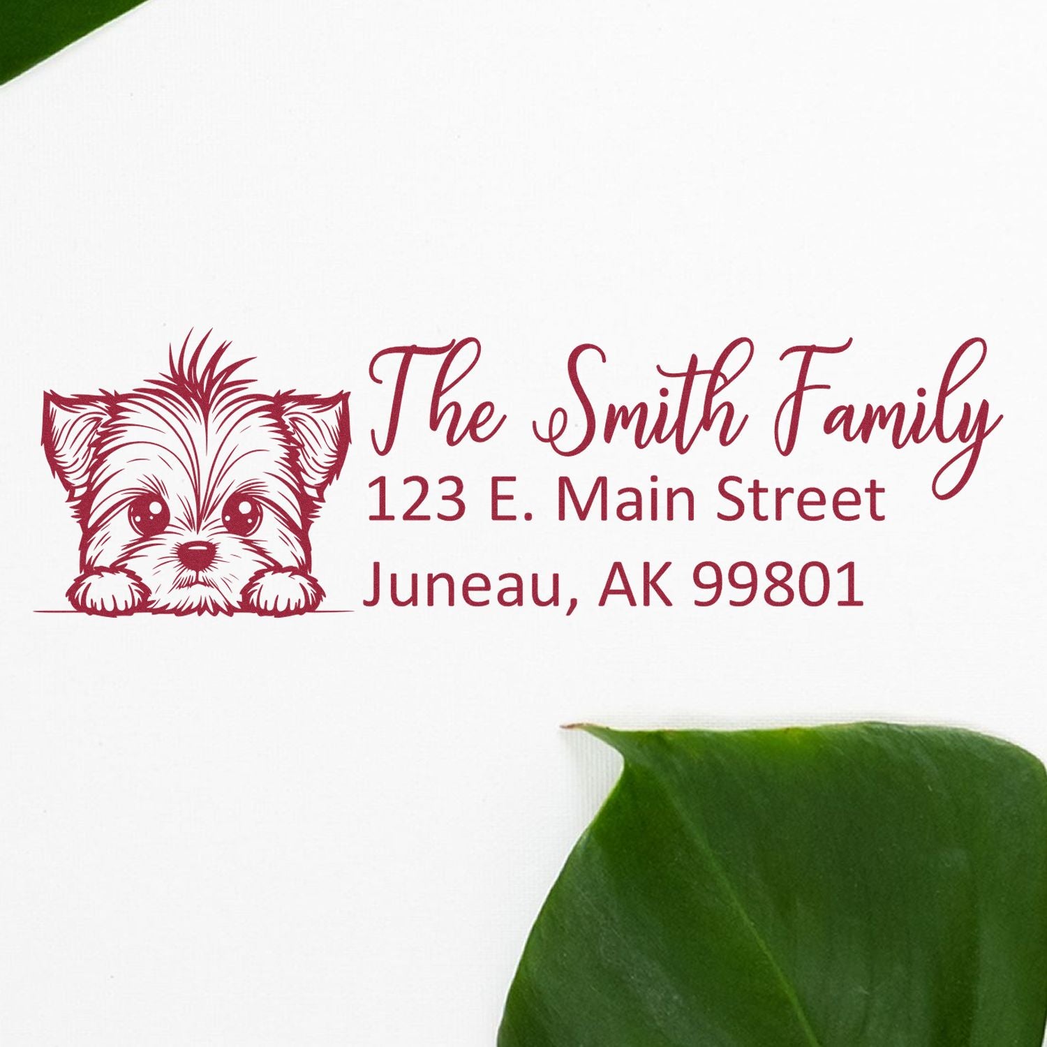 Custom rubber address stamp with puppy design, personalized The Smith Family return address, Juneau, AK.
