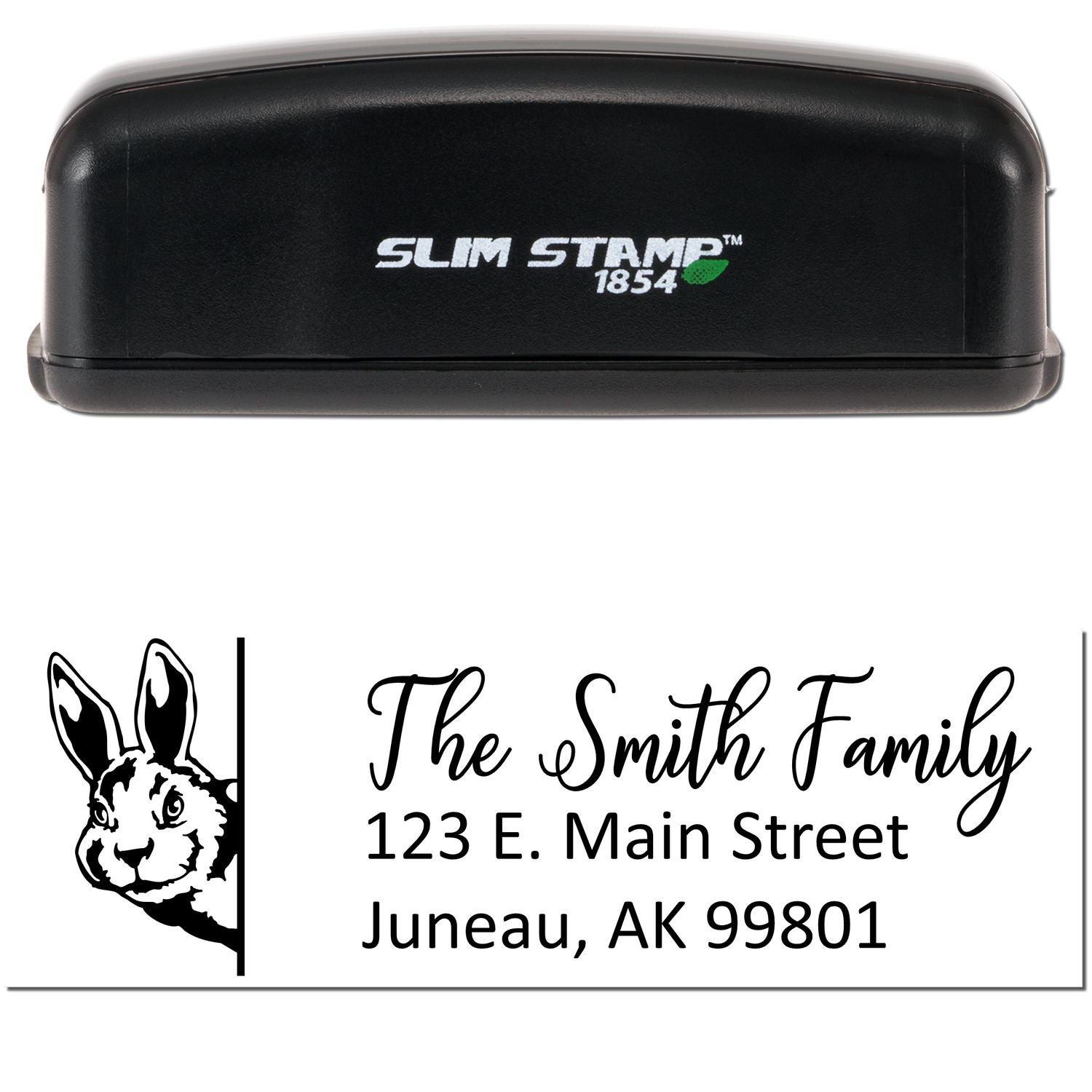 Custom self-inking return address rubber stamp with rabbit design for The Smith Family, Juneau, AK 99801.