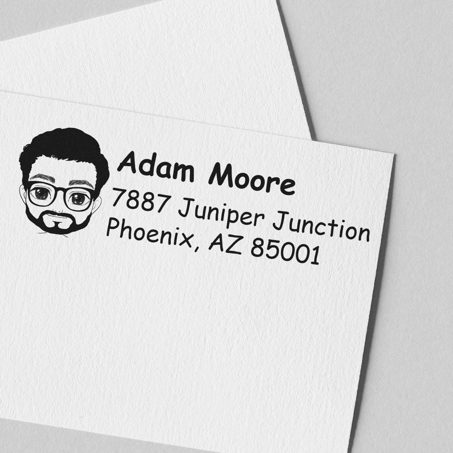 Personalized rubber return address stamp with avatar, name, and Phoenix, AZ return address on envelope mockup.