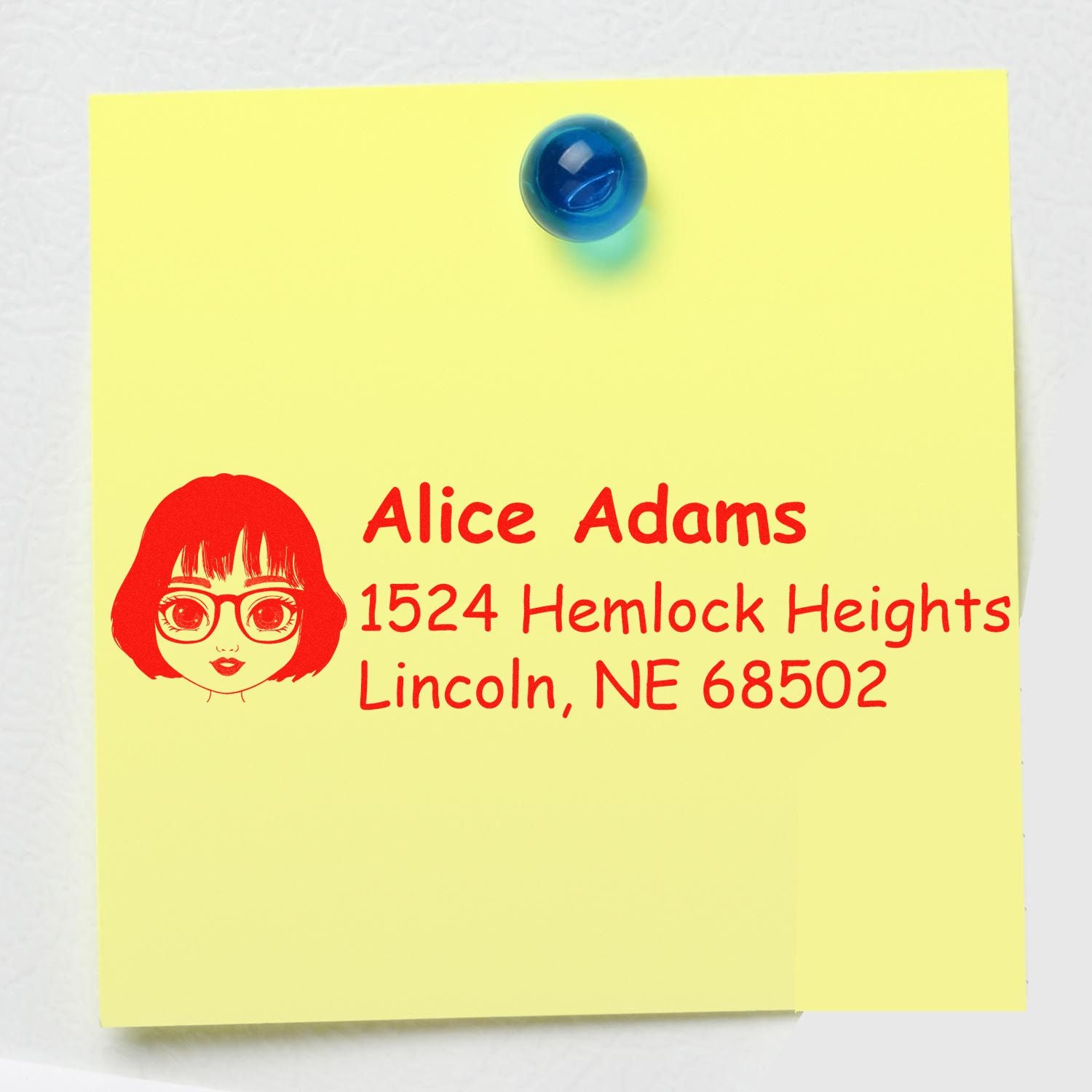 Custom return address rubber stamp sample with Alice Adams address and girl logo on a yellow sticky note.